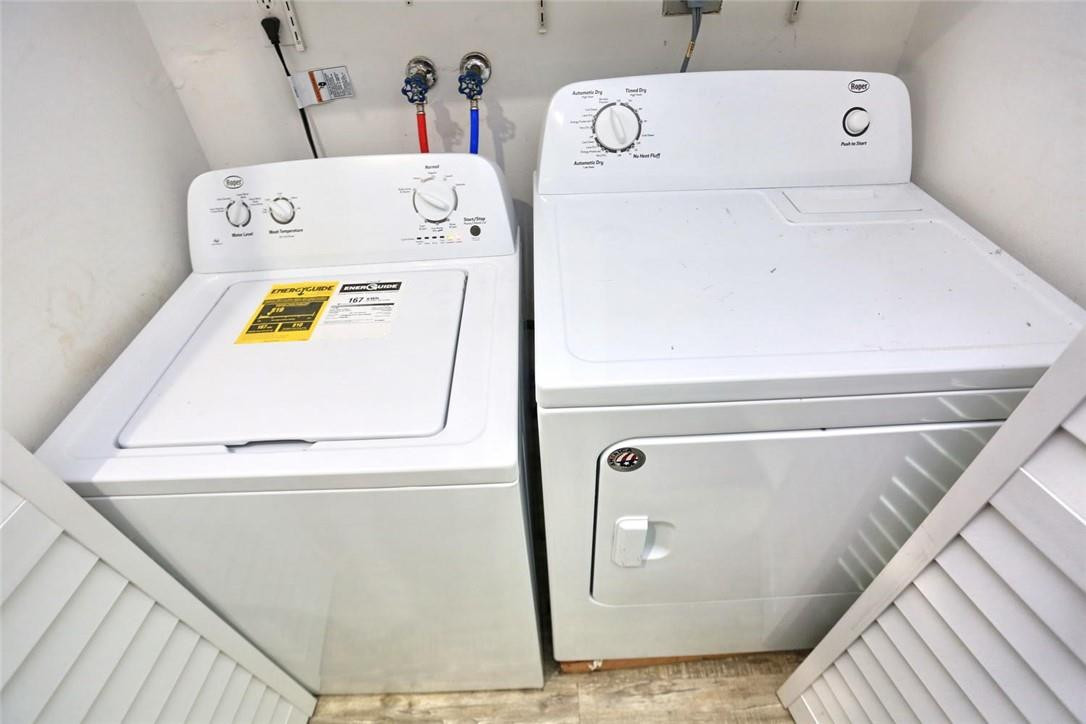 6960 Southwest 1st Street Margate, FL 33068 - Photo 29 of 36 a utility room with dryer and washer