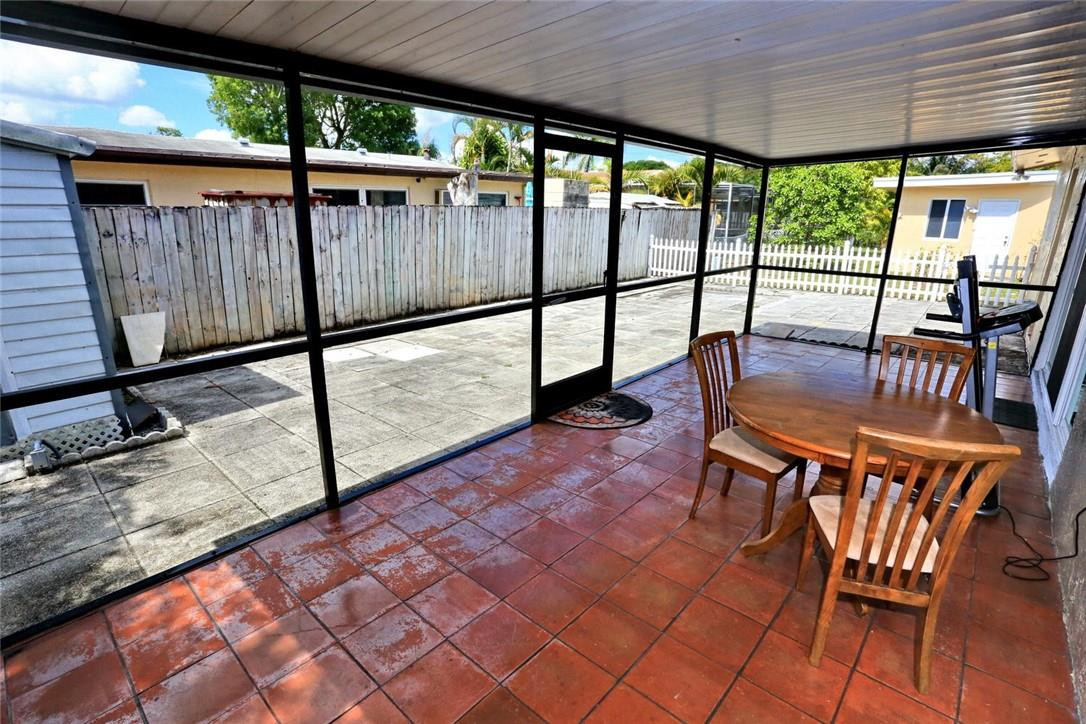 6960 Southwest 1st Street Margate, FL 33068 - Photo 32 of 36 a balcony with table and chairs