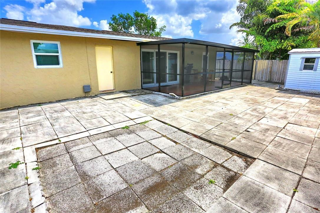 6960 Southwest 1st Street Margate, FL 33068 - Photo 35 of 36 a front view of a house having yard