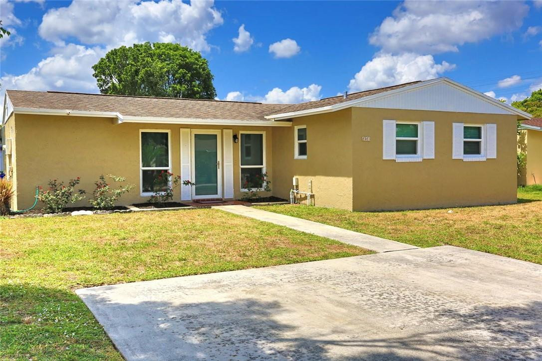 6960 Southwest 1st Street Margate, FL 33068 - Photo 6 of 36 a view of a house with a swimming pool