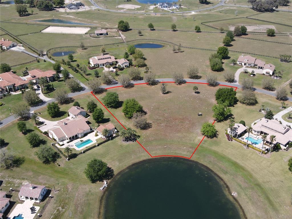 Tbd Southwest 140th Loop, Unit LOT 27S Dunnellon, FL 34432 - Photo 11 of 11 an aerial view of a house with a yard