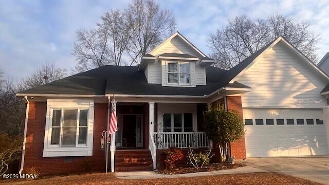 a view of a house with iron fence