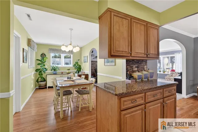 a room with a table and chairs