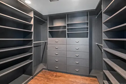 a view of an empty walk in closet