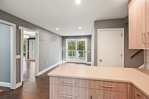 a room with a bed and a window