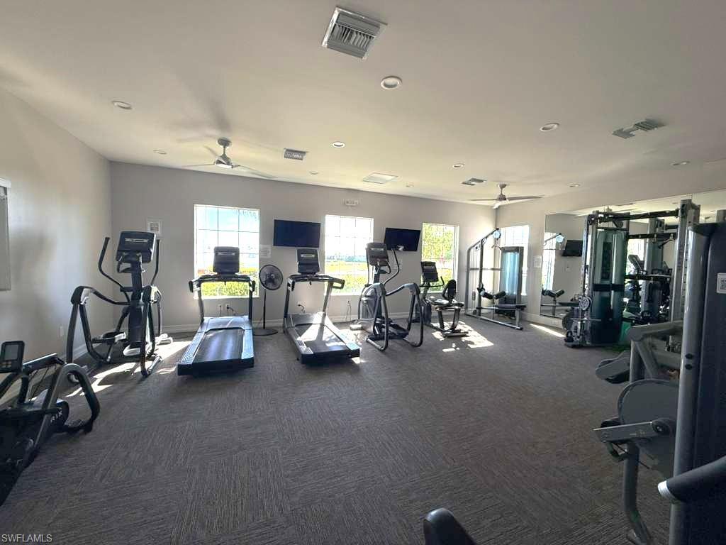 1059 Enbrook Loop Naples, FL 34114 - Photo 19 of 19 Workout area featuring ceiling fan and recessed lighting