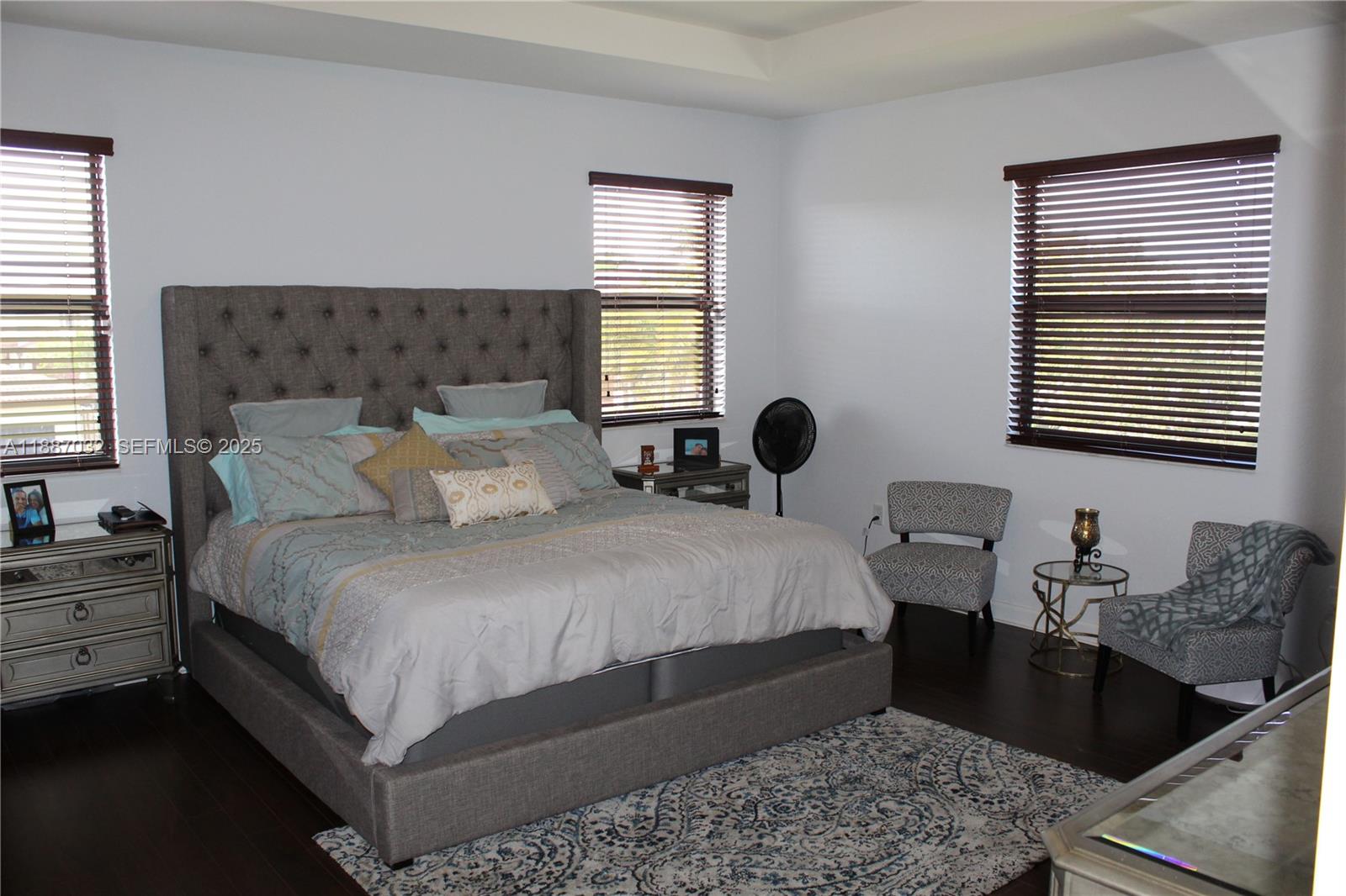 3728 Southeast 5th Court Homestead, FL 33033 - Photo 8 of 26 a bedroom with bed chair and window