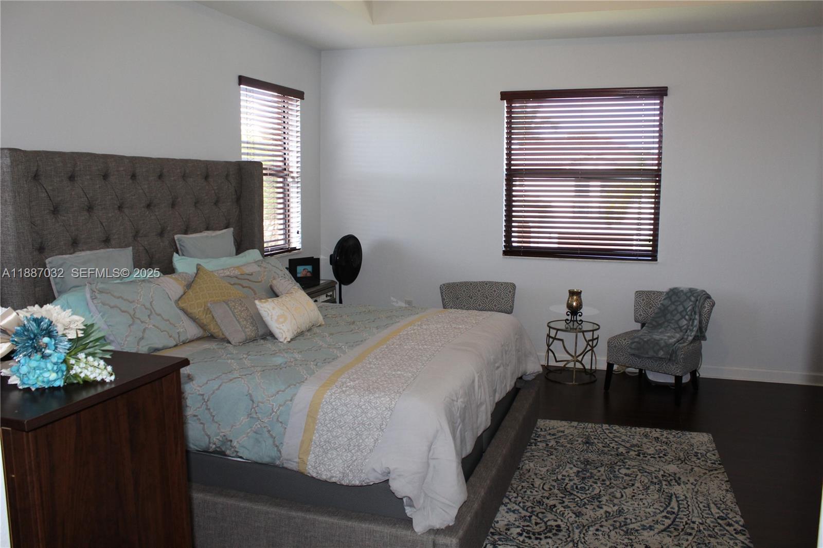 3728 Southeast 5th Court Homestead, FL 33033 - Photo 9 of 26 a bedroom with bed and a window