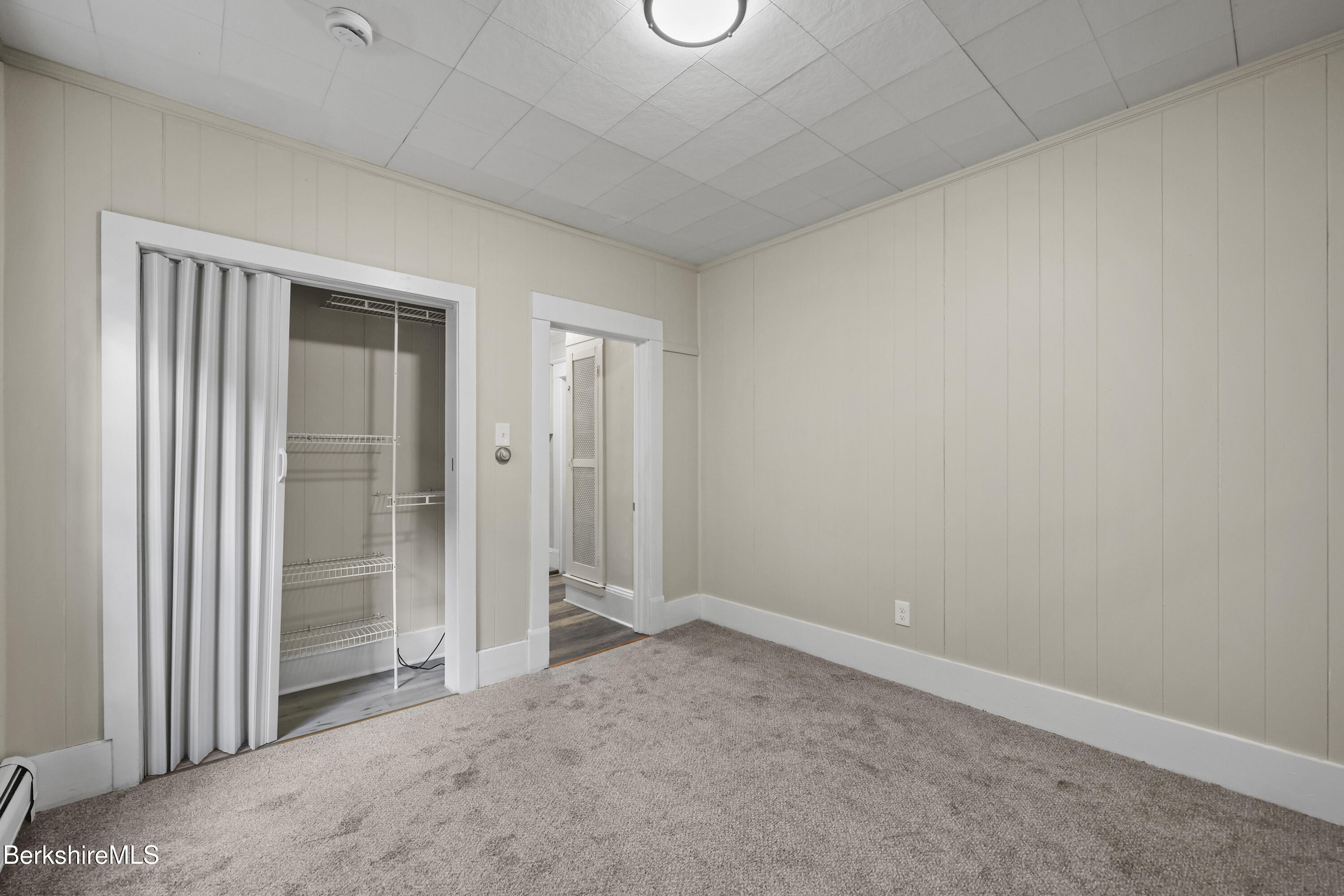 41-43 Reed Street Pittsfield, MA 01201 - Photo 18 of 56 an empty room with closet area