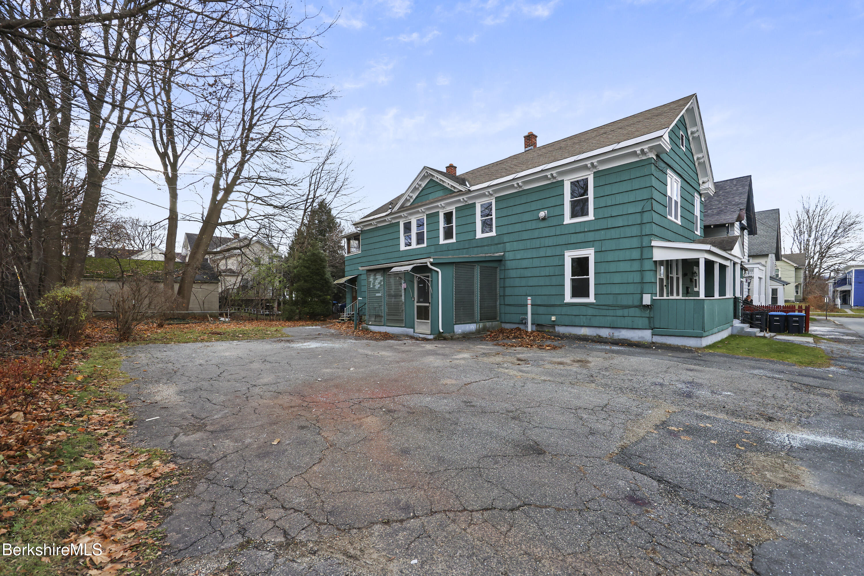 41-43 Reed Street Pittsfield, MA 01201 - Photo 2 of 56 a view of a house with a yard and large tree