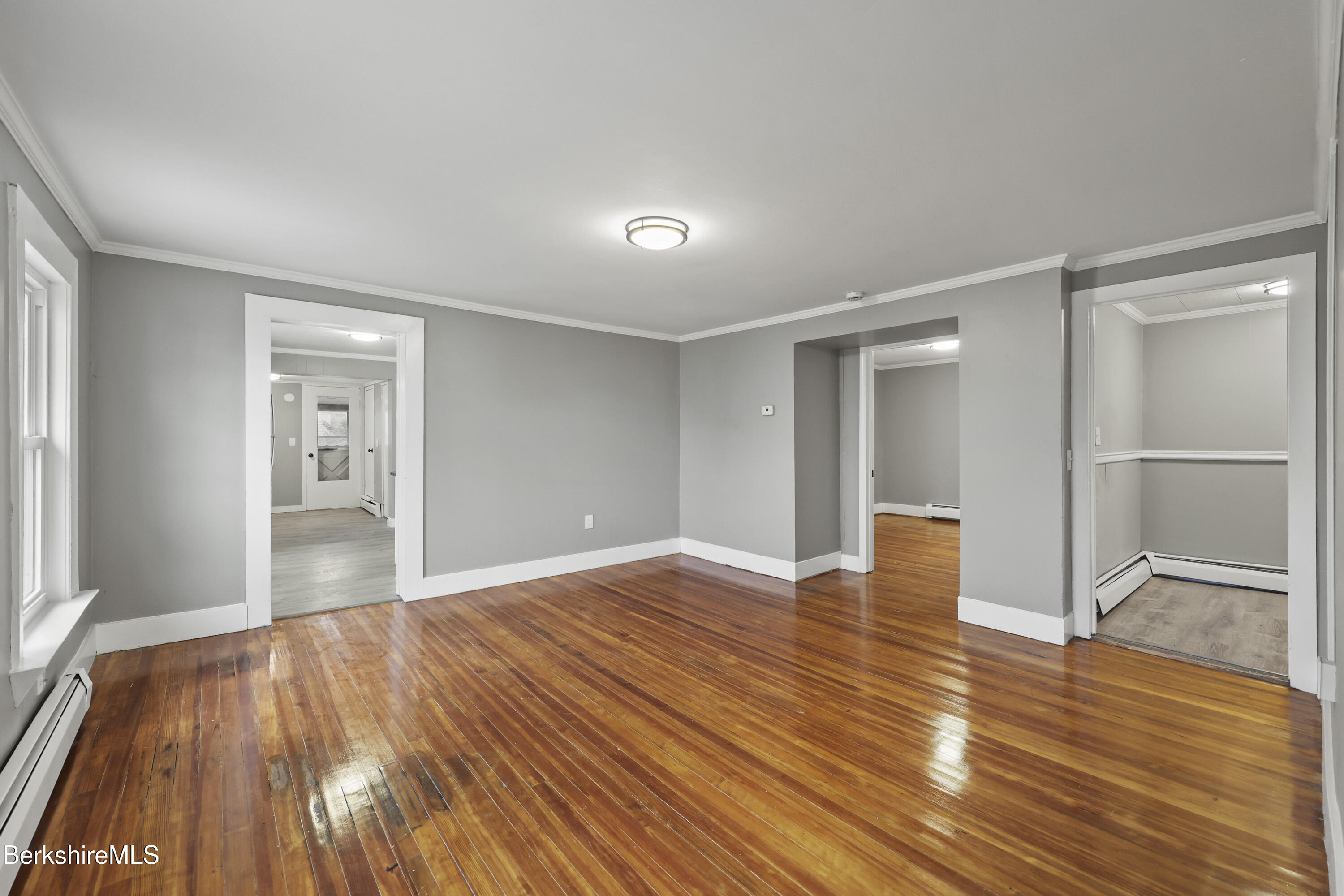 41-43 Reed Street Pittsfield, MA 01201 - Photo 31 of 56 a view of empty room with wooden floor