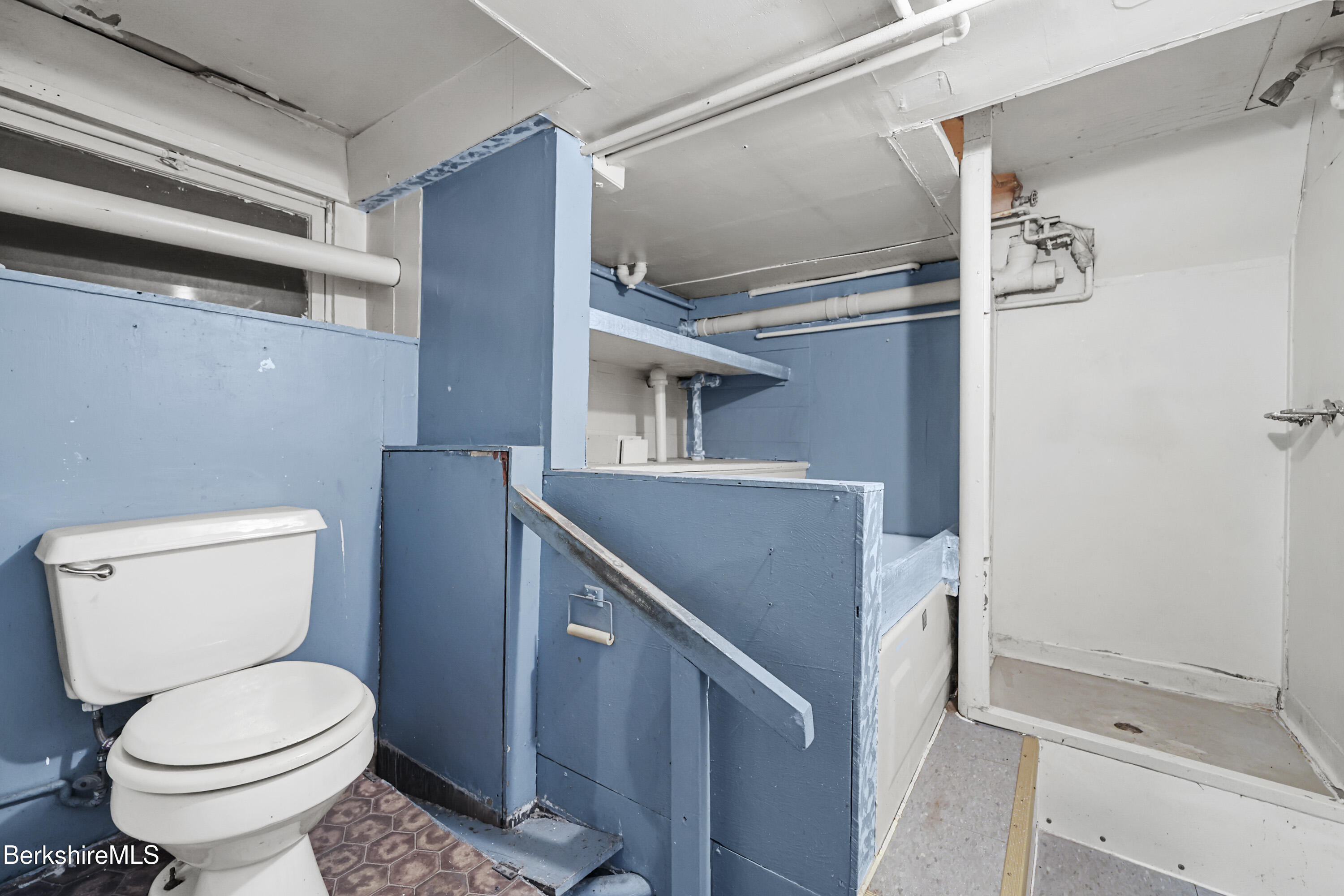 41-43 Reed Street Pittsfield, MA 01201 - Photo 56 of 56 a bathroom with a toilet and a shower