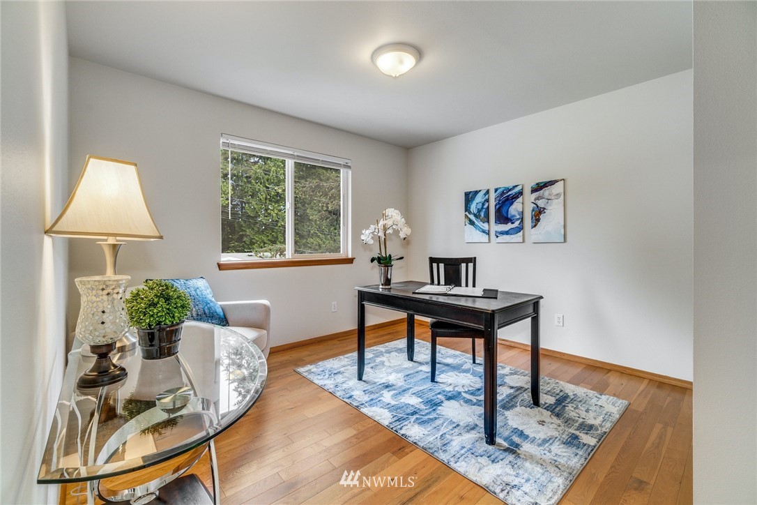 19212 1st Avenue West Bothell, WA 98012 - Photo 12 of 22 a living room with furniture and a window