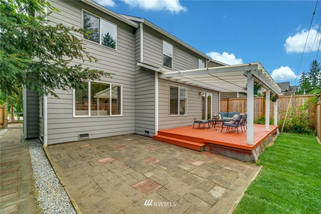 19212 1st Avenue West Bothell, WA 98012 - Photo 22 of 22 a view of a house with swimming pool patio and a yard