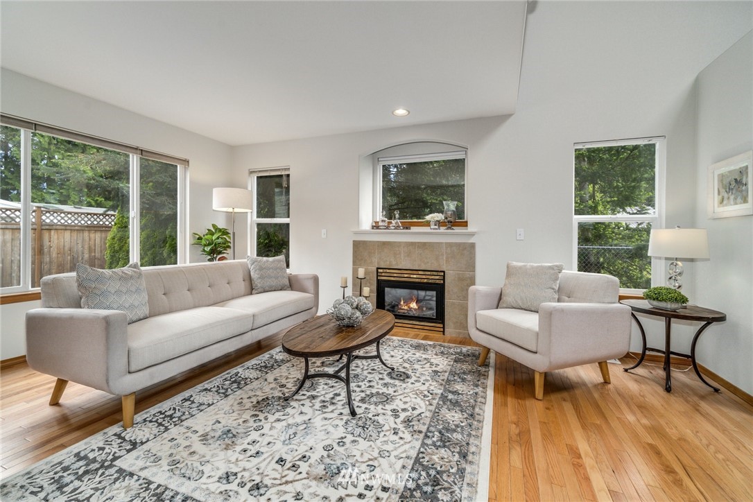 19212 1st Avenue West Bothell, WA 98012 - Photo 10 of 22 a living room with furniture and a fireplace
