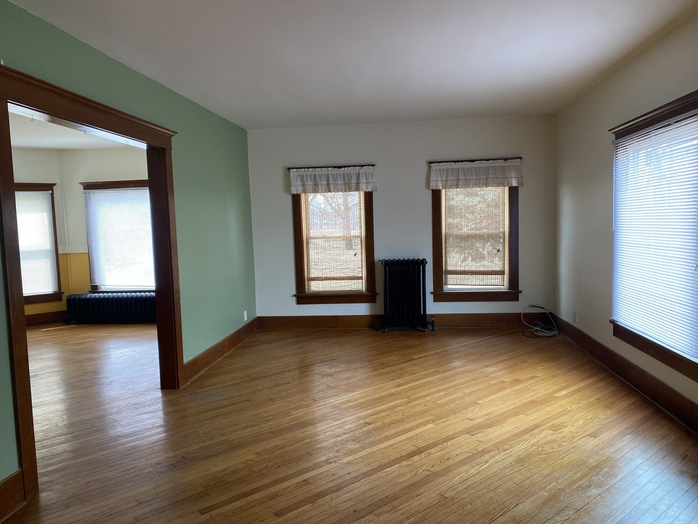 Undisclosed Address Maple Park, IL 60119 - Photo 11 of 27 an empty room with wooden floor and windows