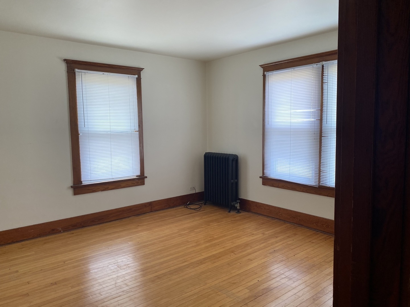 Undisclosed Address Maple Park, IL 60119 - Photo 21 of 27 a view of an empty room with wooden floor and a window