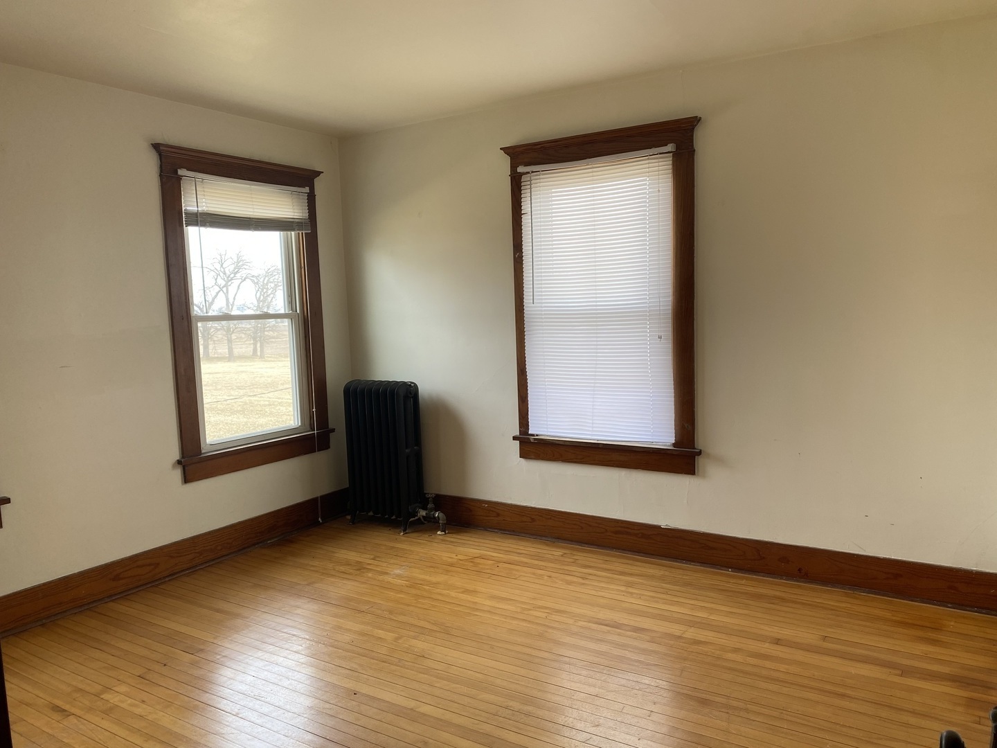 Undisclosed Address Maple Park, IL 60119 - Photo 22 of 27 a view of an empty room with wooden floor and a window