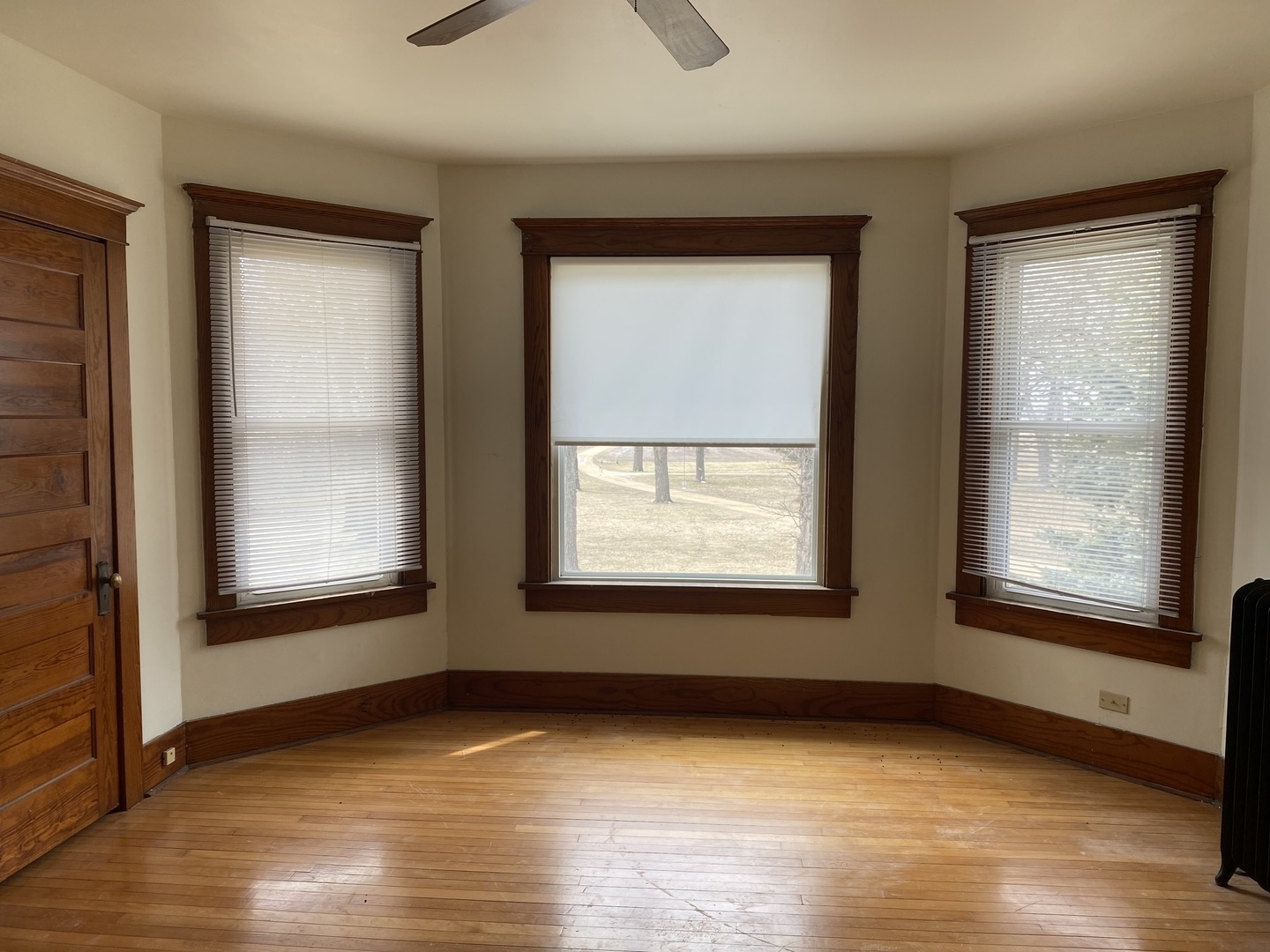 Undisclosed Address Maple Park, IL 60119 - Photo 23 of 27 a view of an empty room with wooden floor and a window
