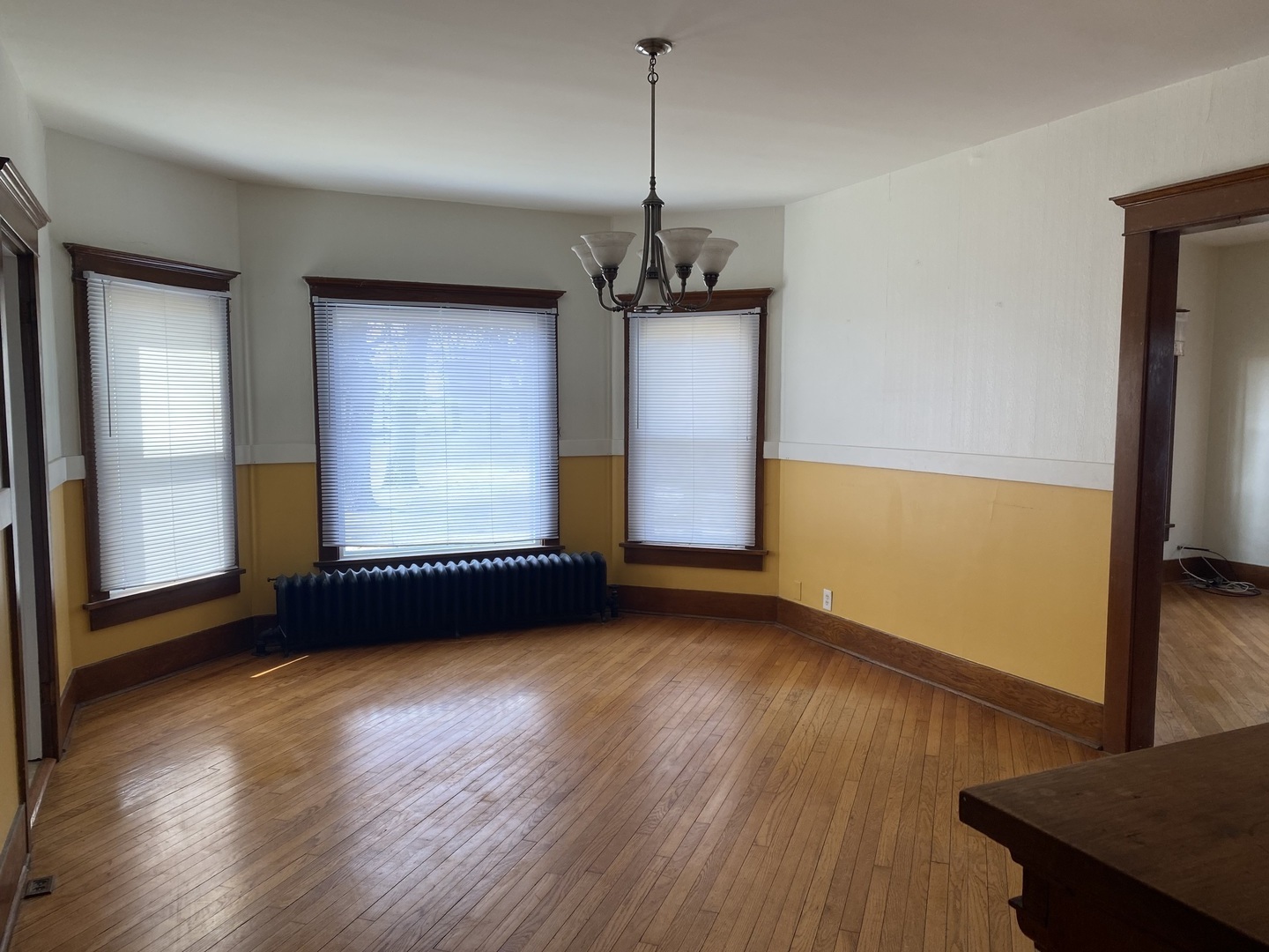Undisclosed Address Maple Park, IL 60119 - Photo 10 of 27 a view of an empty room with wooden floor and a window