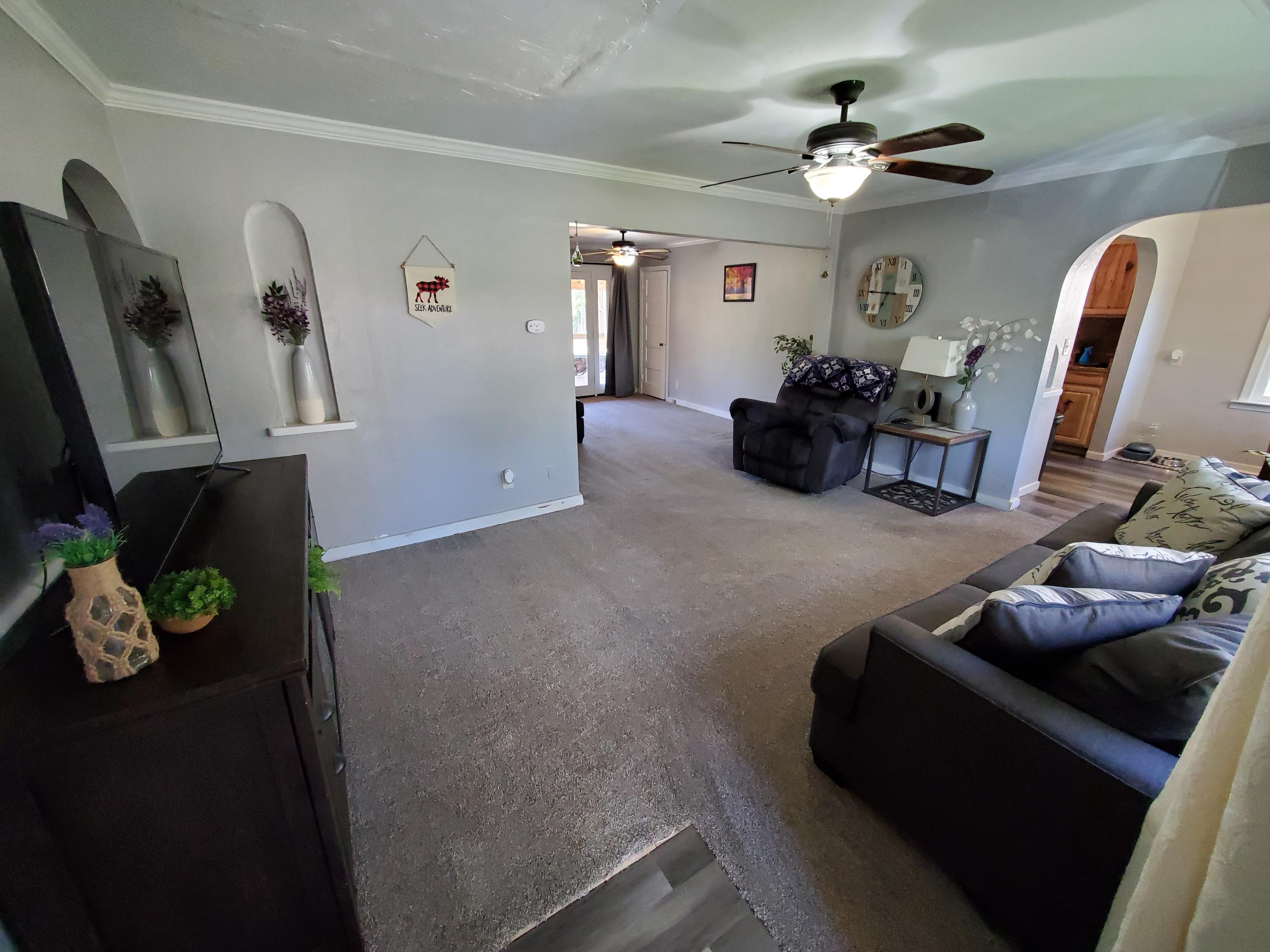 2476 California Street Redding, CA 96001 - Photo 11 of 32 a living room with furniture and a flat screen tv