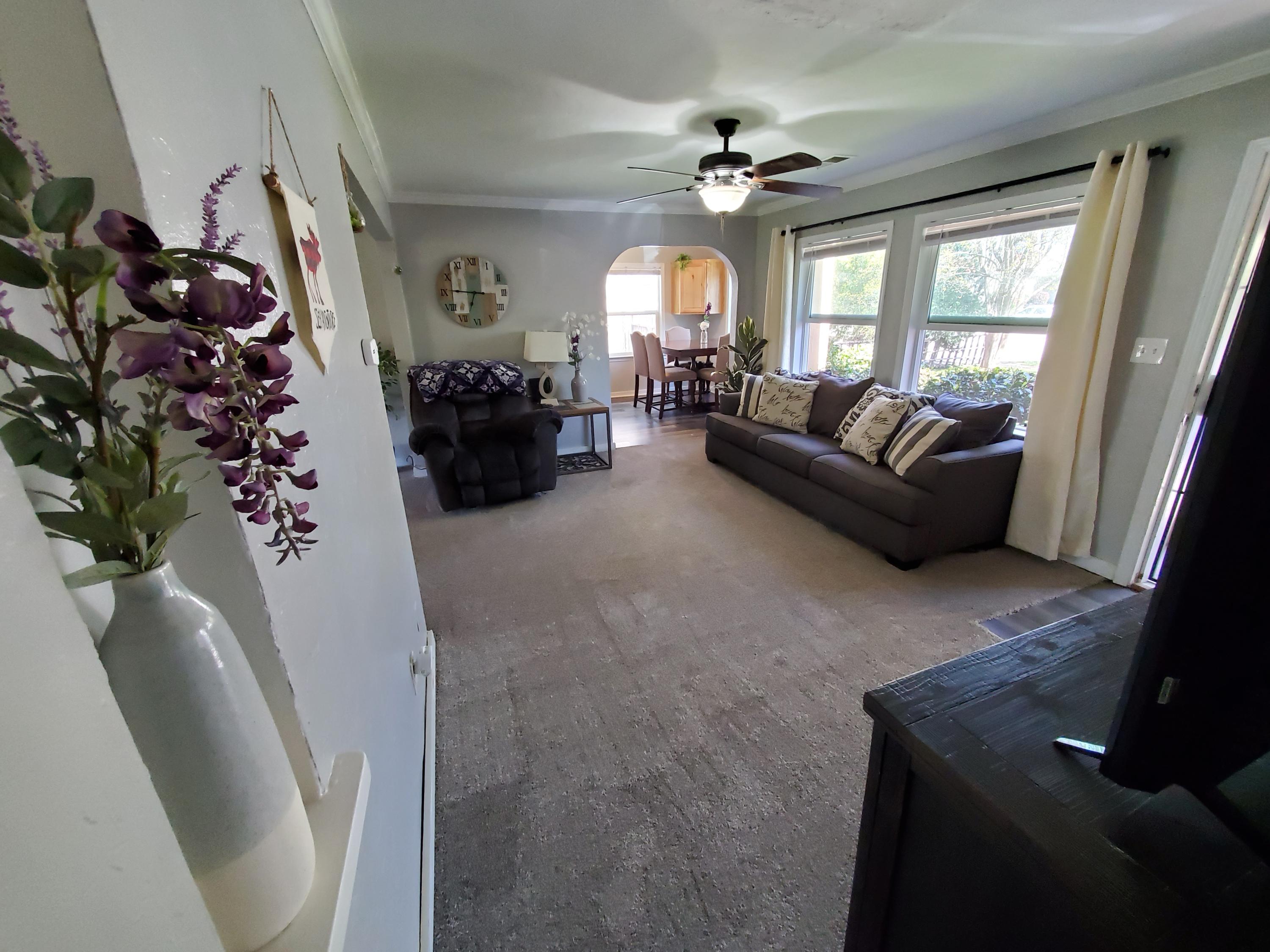 2476 California Street Redding, CA 96001 - Photo 12 of 32 a living room with furniture and a large window
