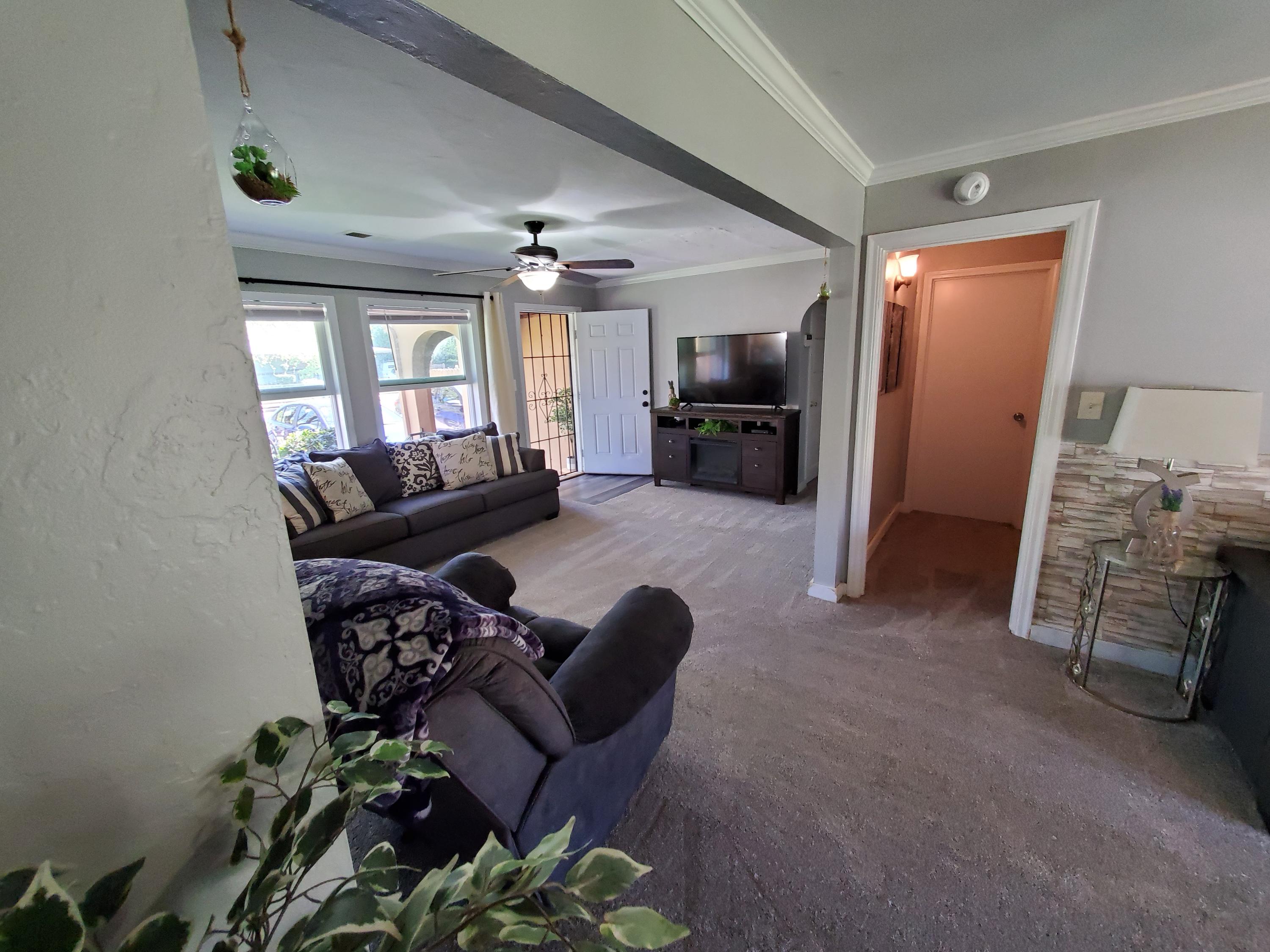 2476 California Street Redding, CA 96001 - Photo 15 of 32 a living room with furniture and a flat screen tv