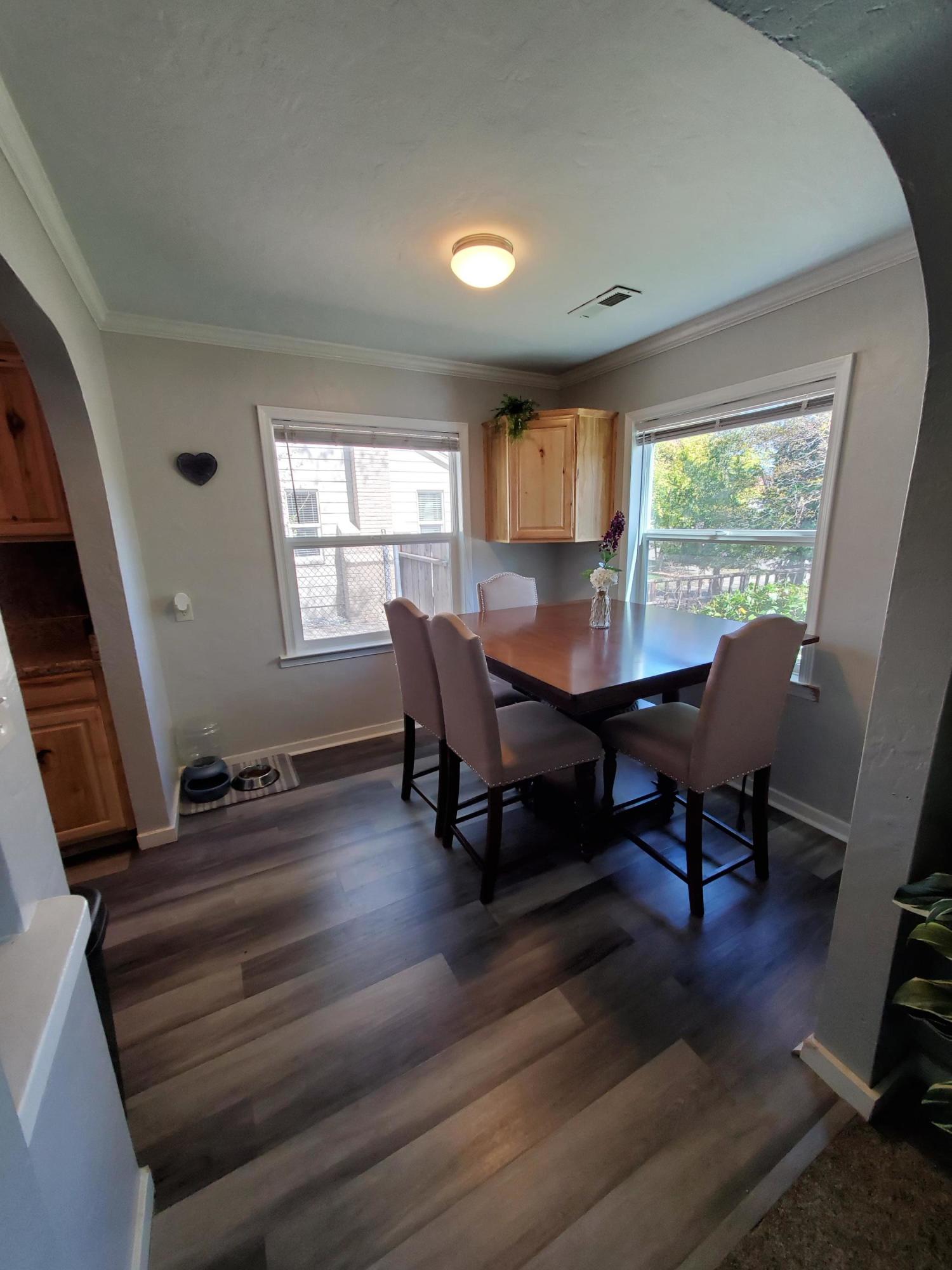 2476 California Street Redding, CA 96001 - Photo 21 of 32 a workspace with wooden floor and a window