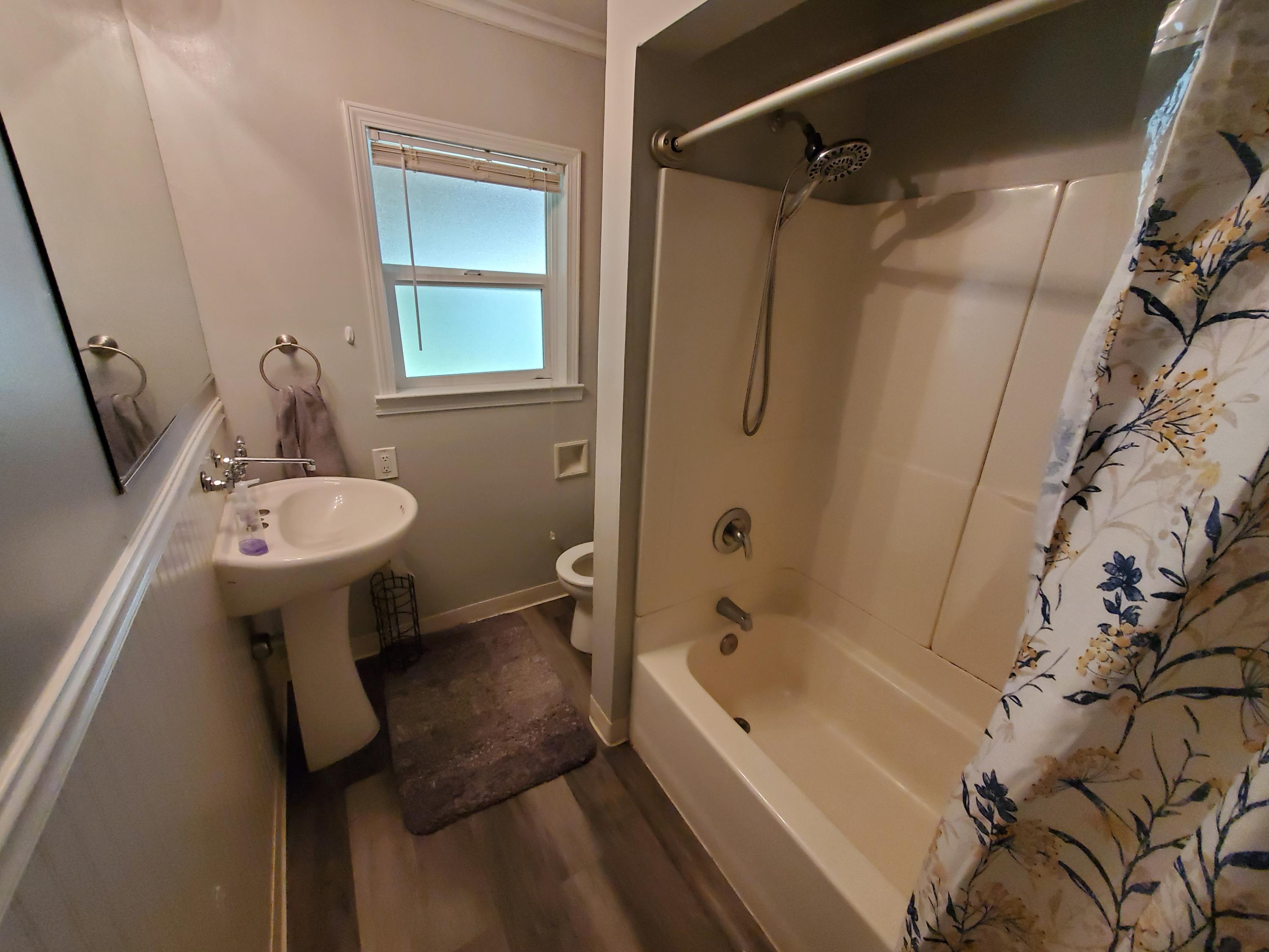 2476 California Street Redding, CA 96001 - Photo 27 of 32 a bathroom with a sink toilet and shower