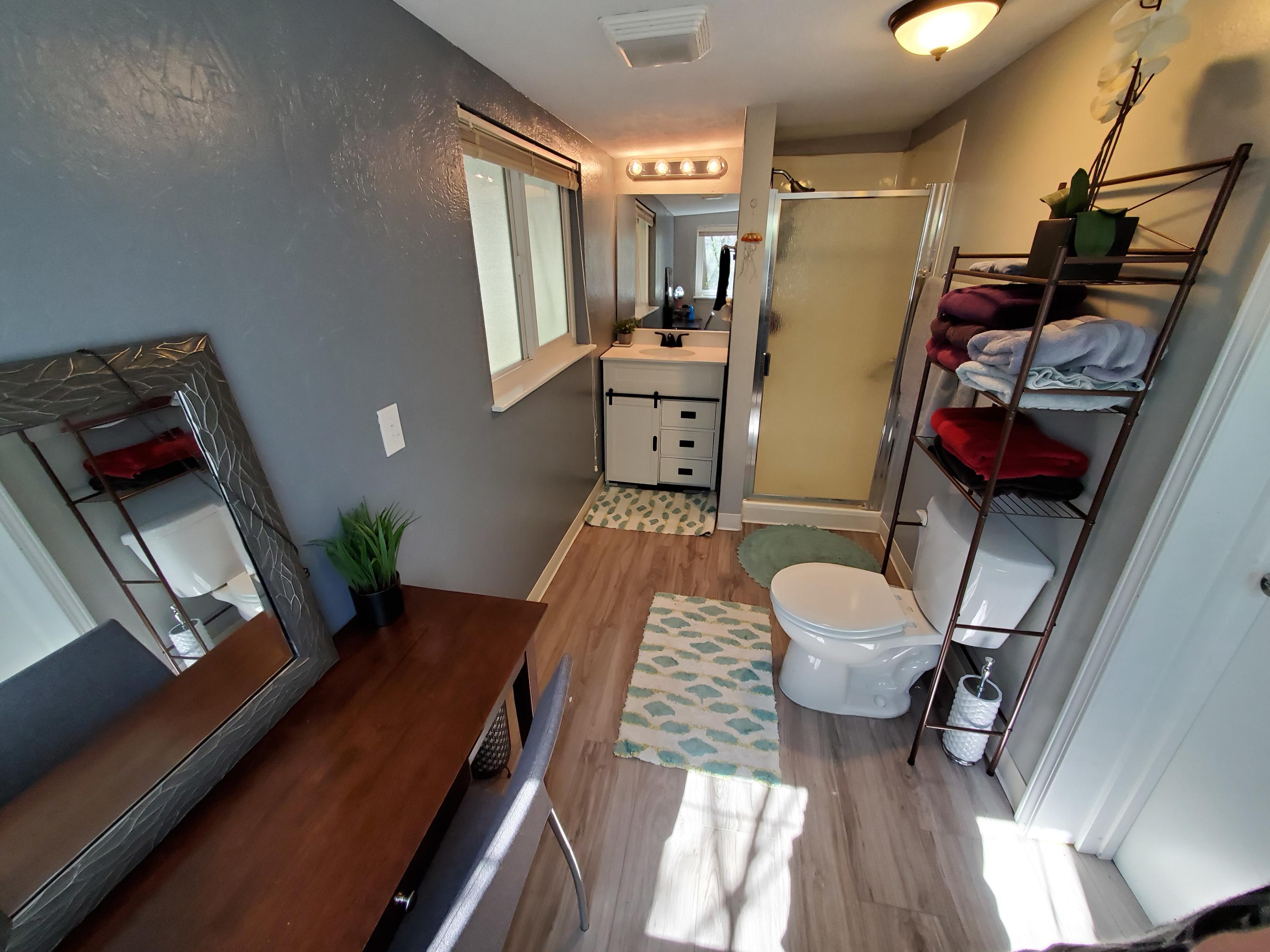 2476 California Street Redding, CA 96001 - Photo 28 of 32 a living room with furniture and a window