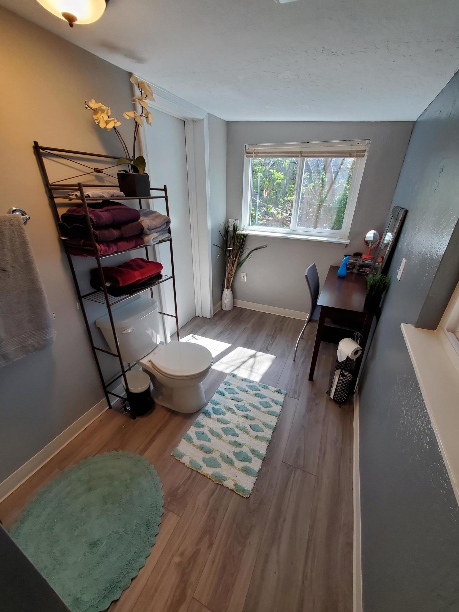 2476 California Street Redding, CA 96001 - Photo 30 of 32 a living room with furniture and a window