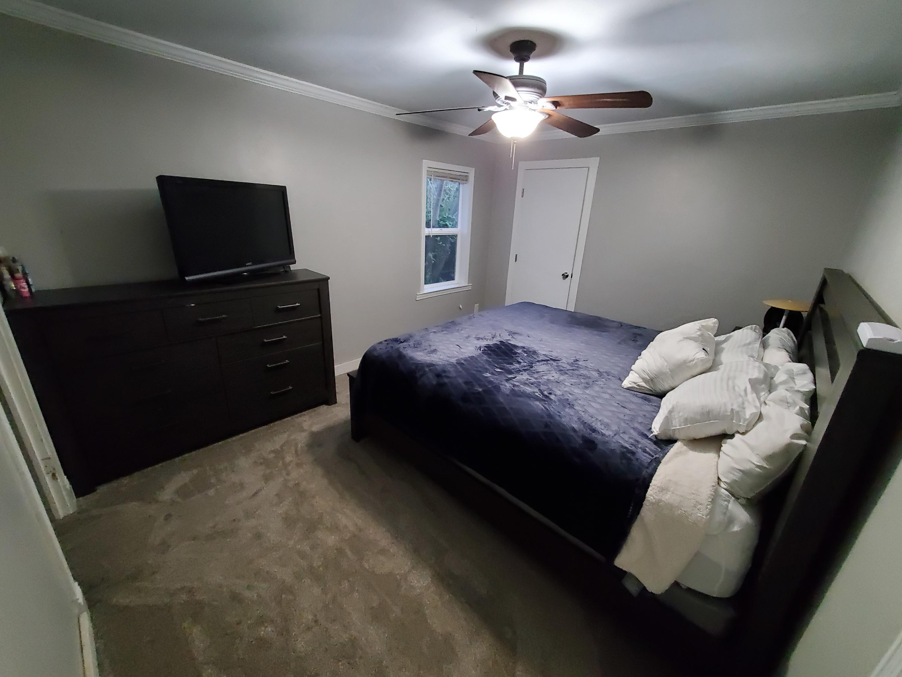 2476 California Street Redding, CA 96001 - Photo 31 of 32 a bedroom with a bed and a flat screen tv