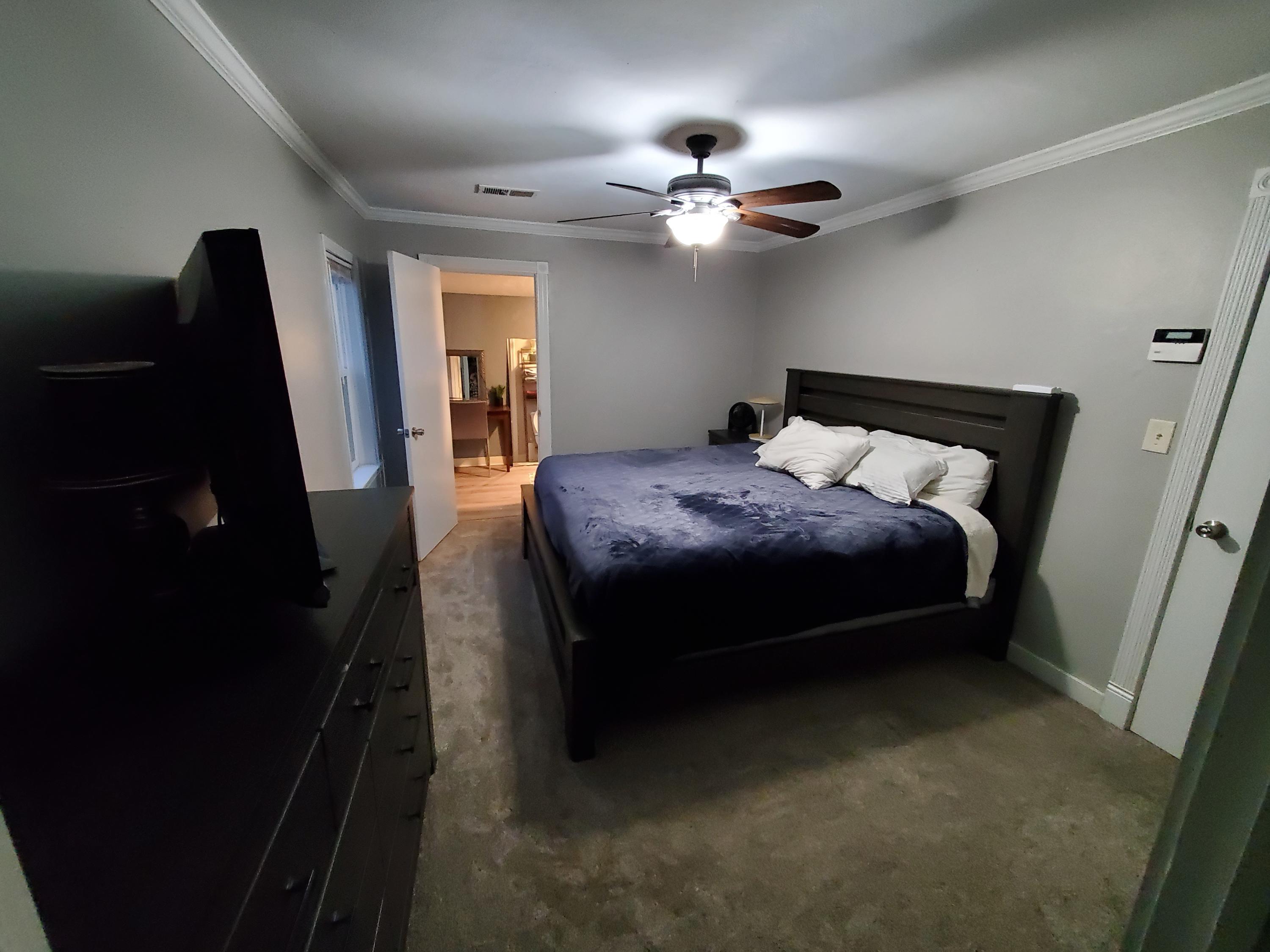 2476 California Street Redding, CA 96001 - Photo 32 of 32 a bed room with a bed and a mirror