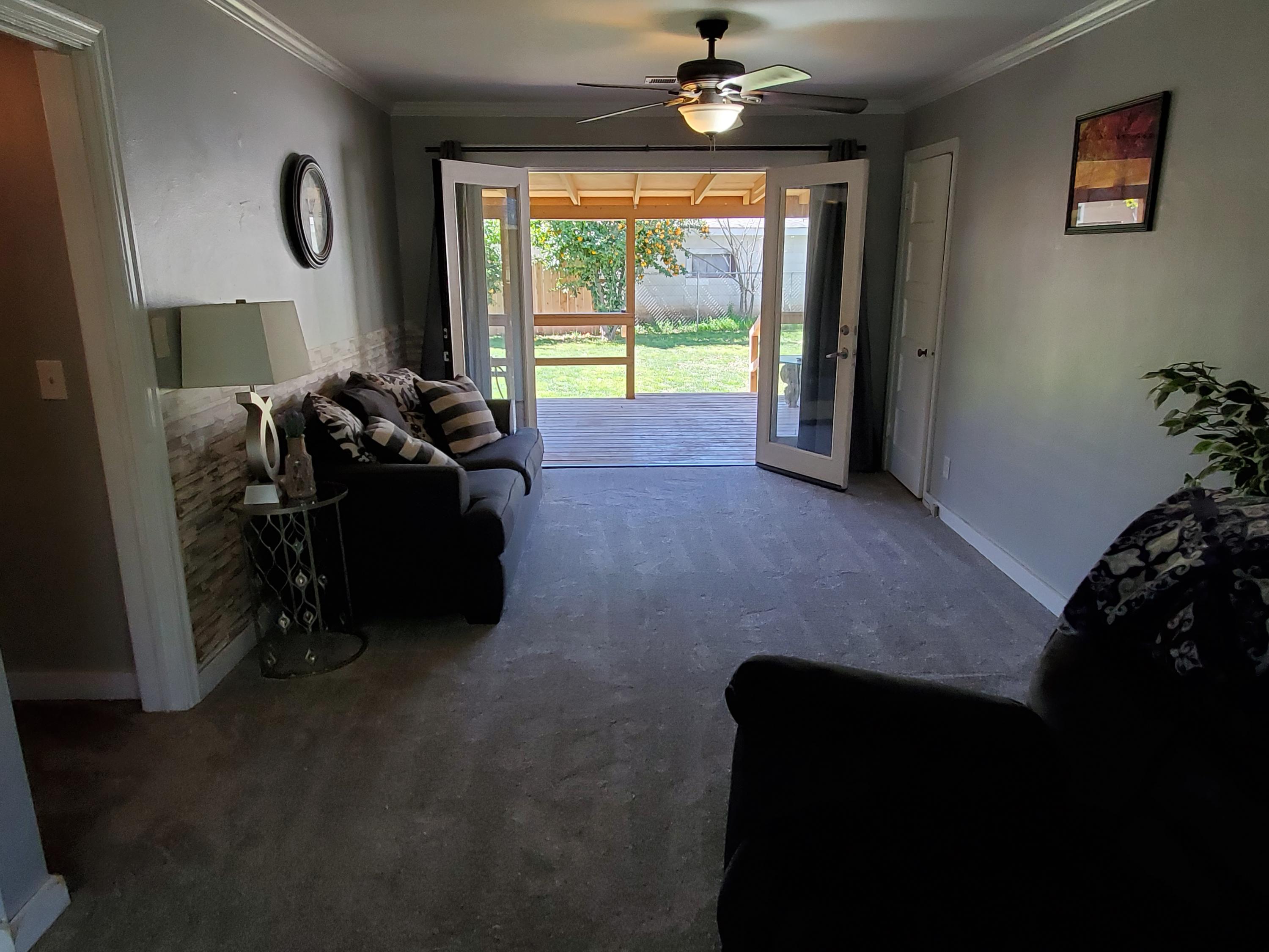 2476 California Street Redding, CA 96001 - Photo 10 of 32 a bed room with furniture and a window