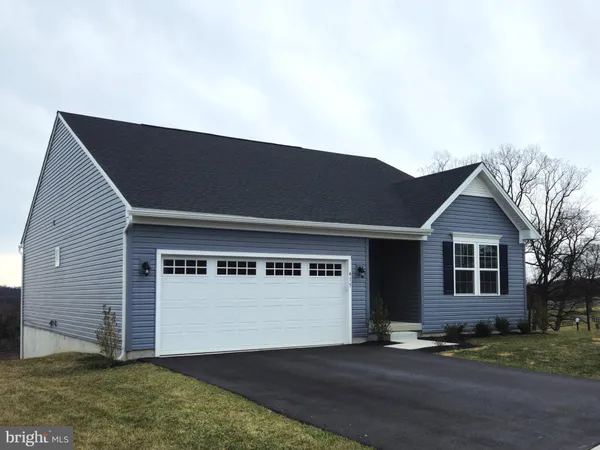 a view of a house with a garage
