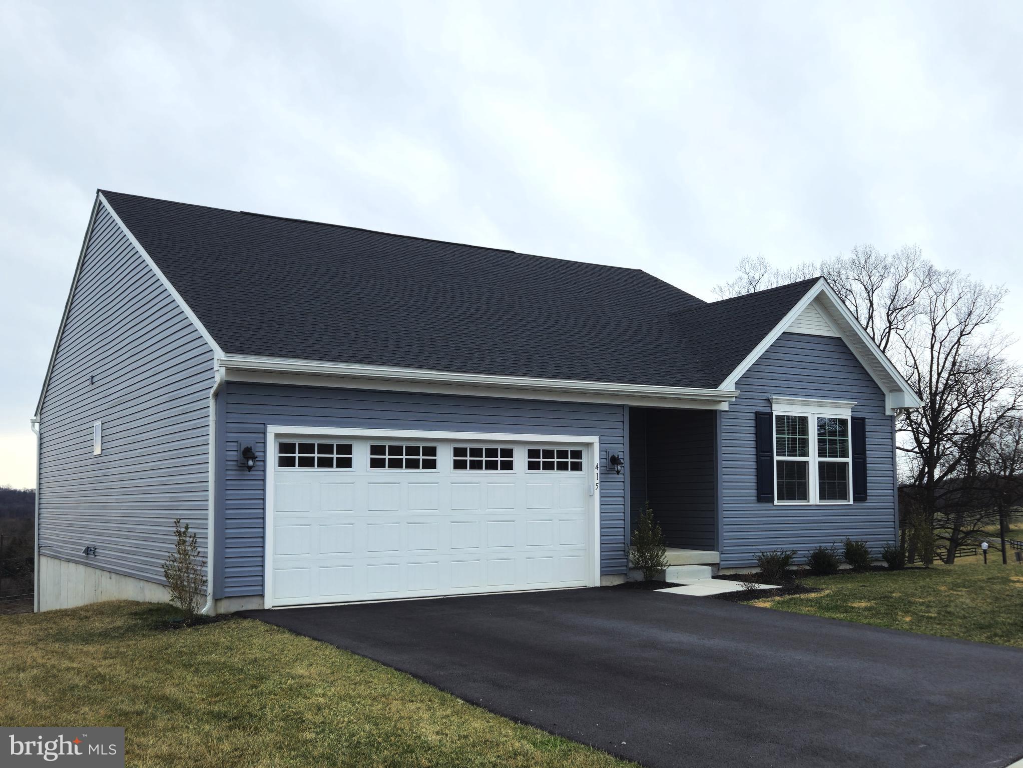 a view of a house with a garage