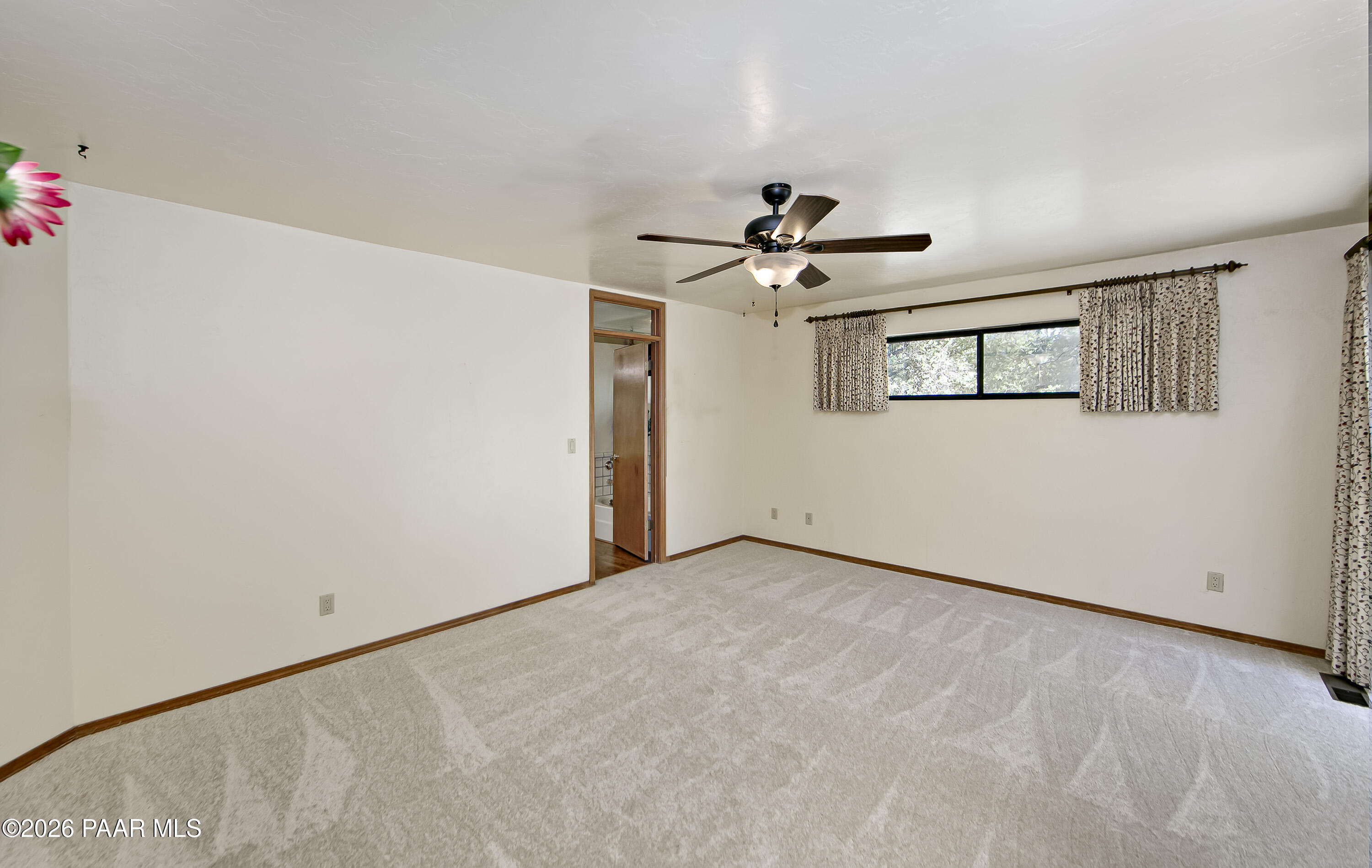 305 Ridge Court Prescott, AZ 86303 - Photo 12 of 35 a view of an empty room with a window