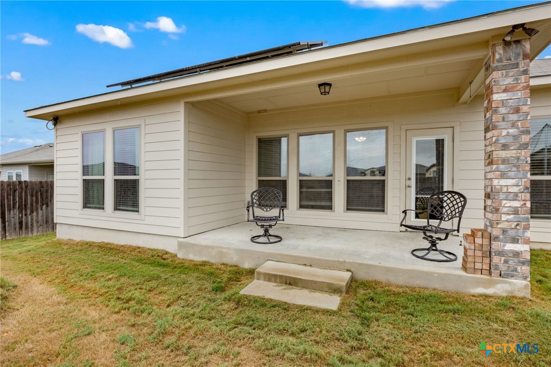 7617 Lee Hall Loop Temple, TX 76502 - Photo 20 of 26 a house view with a sitting space and garden space