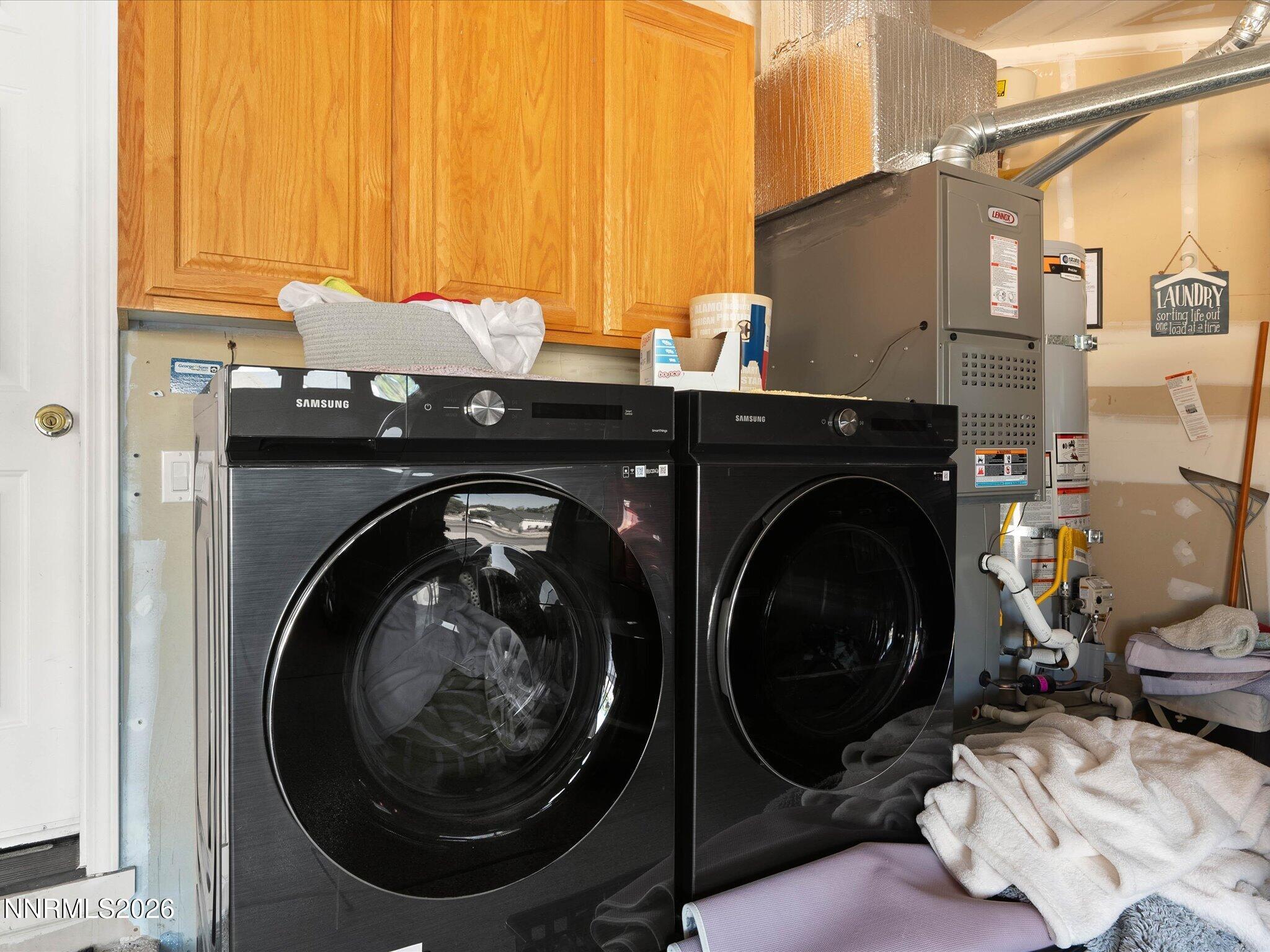 1080 Red Rock Road Fernley, NV 89408 - Photo 31 of 45 a utility room with dryer and washer