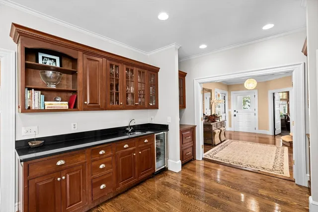 a spacious bathroom with a granite countertop sink
