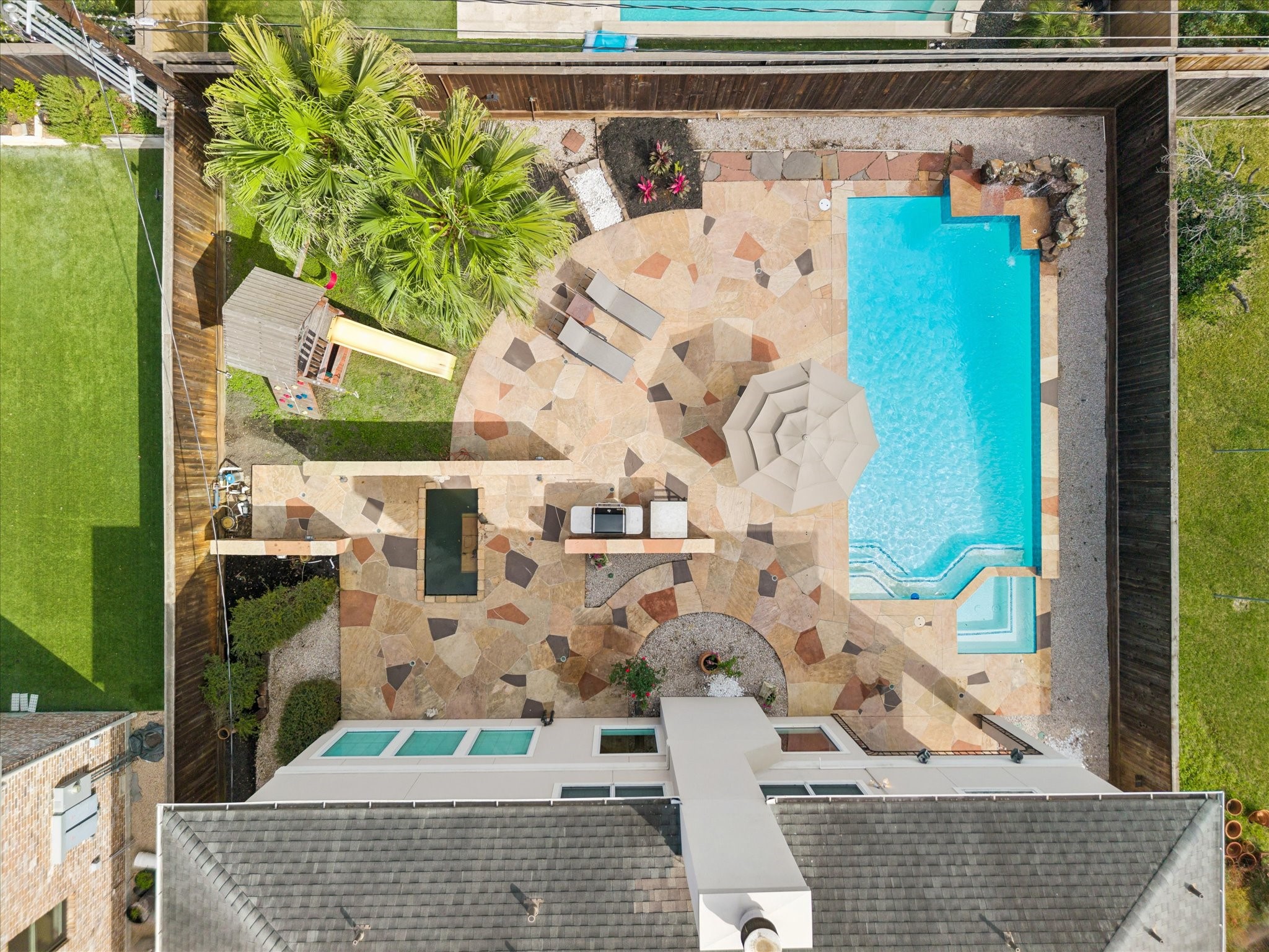 4606 Birch Street Bellaire, TX 77401 - Photo 2 of 45 a picture of a building with outdoor seating