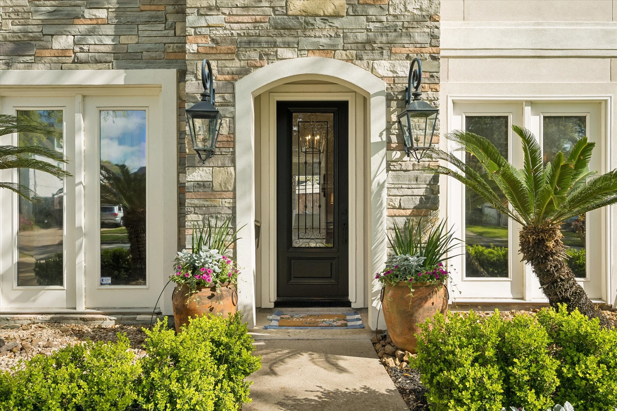 4606 Birch Street Bellaire, TX 77401 - Photo 3 of 45 front view of a house with a window
