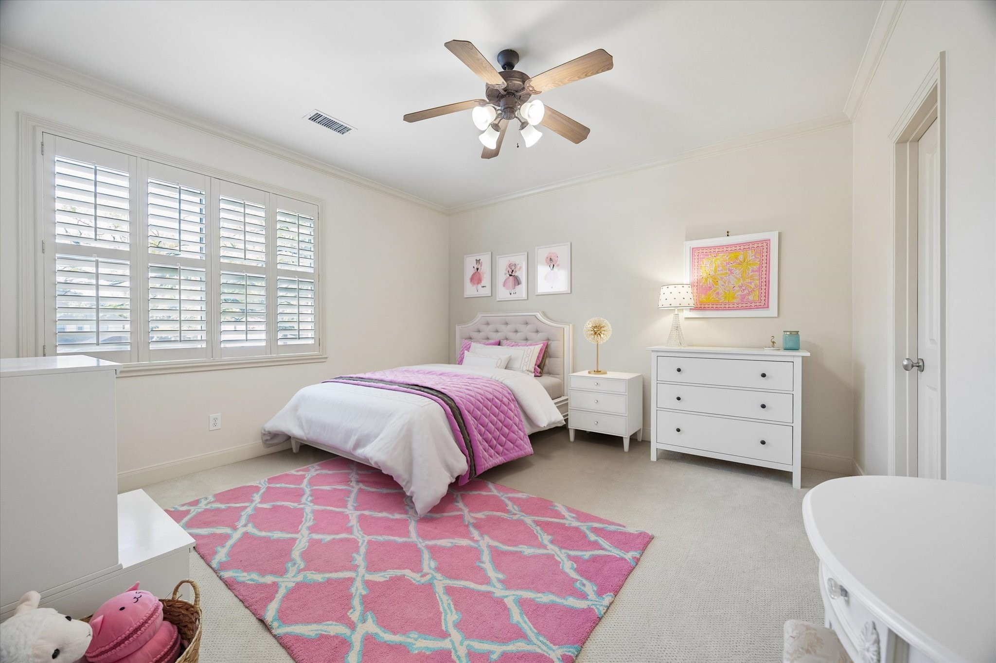 4606 Birch Street Bellaire, TX 77401 - Photo 34 of 45 a bedroom with a bed and a couch