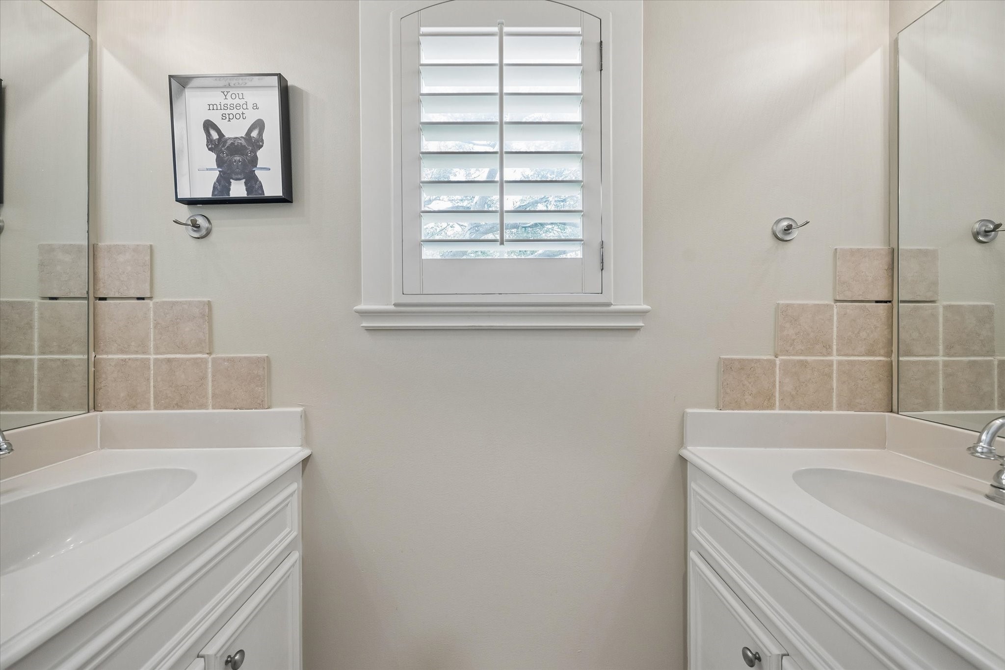 4606 Birch Street Bellaire, TX 77401 - Photo 38 of 45 a bathroom with a sink and a bathtub