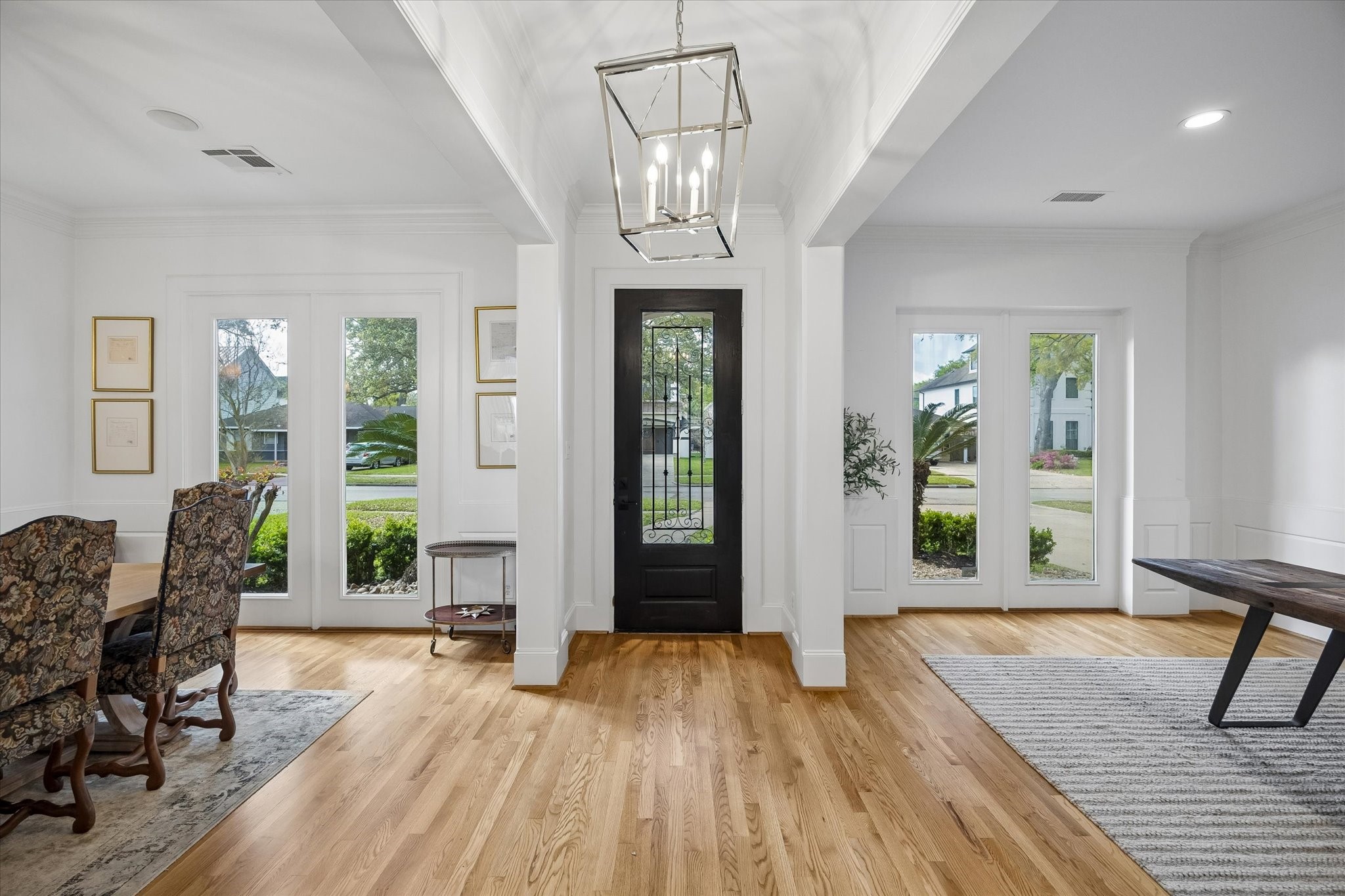 4606 Birch Street Bellaire, TX 77401 - Photo 5 of 45 a view of a livingroom with furniture window and wooden floor