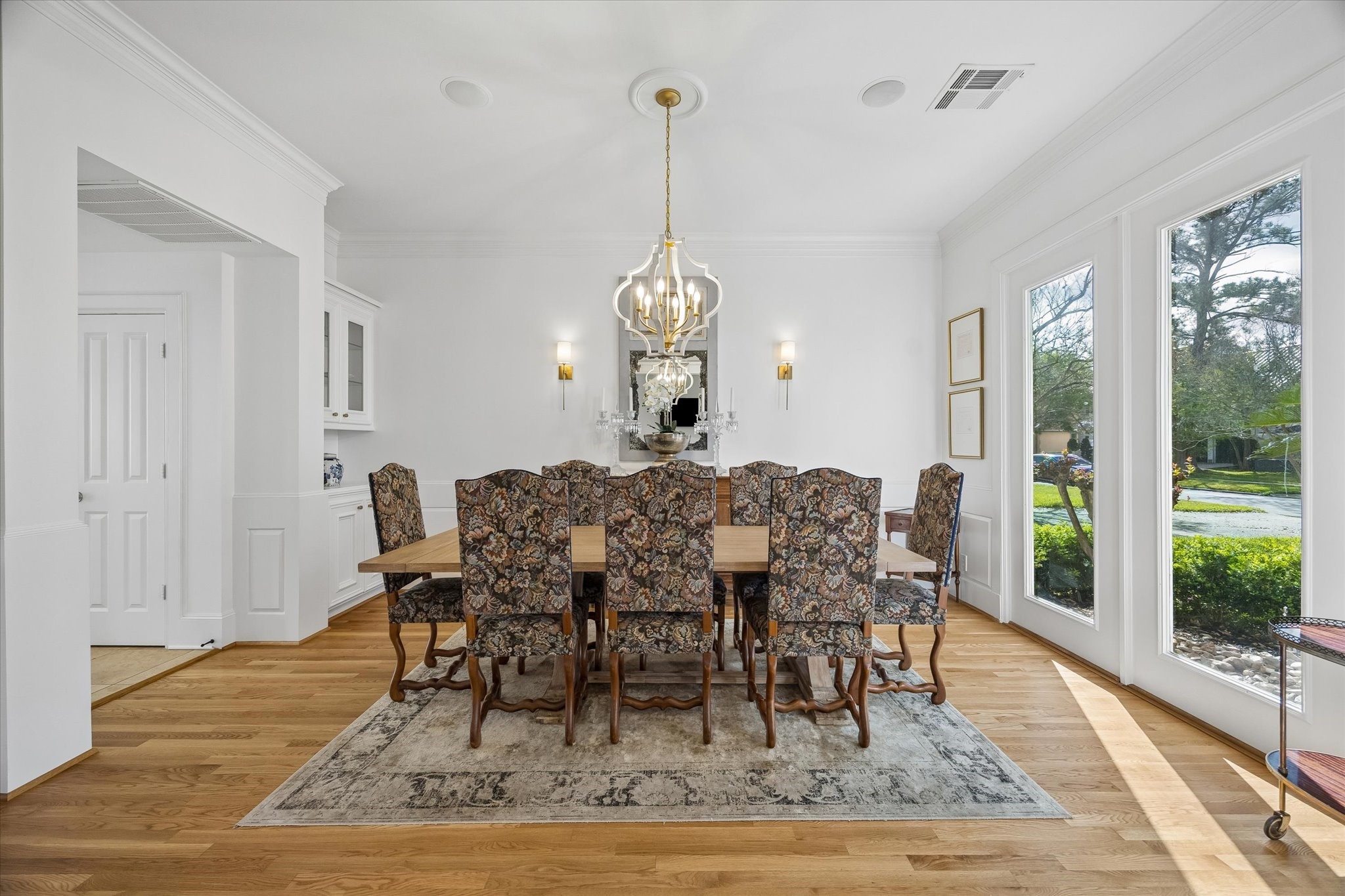 4606 Birch Street Bellaire, TX 77401 - Photo 6 of 45 a view of a dining room with furniture window and wooden floor