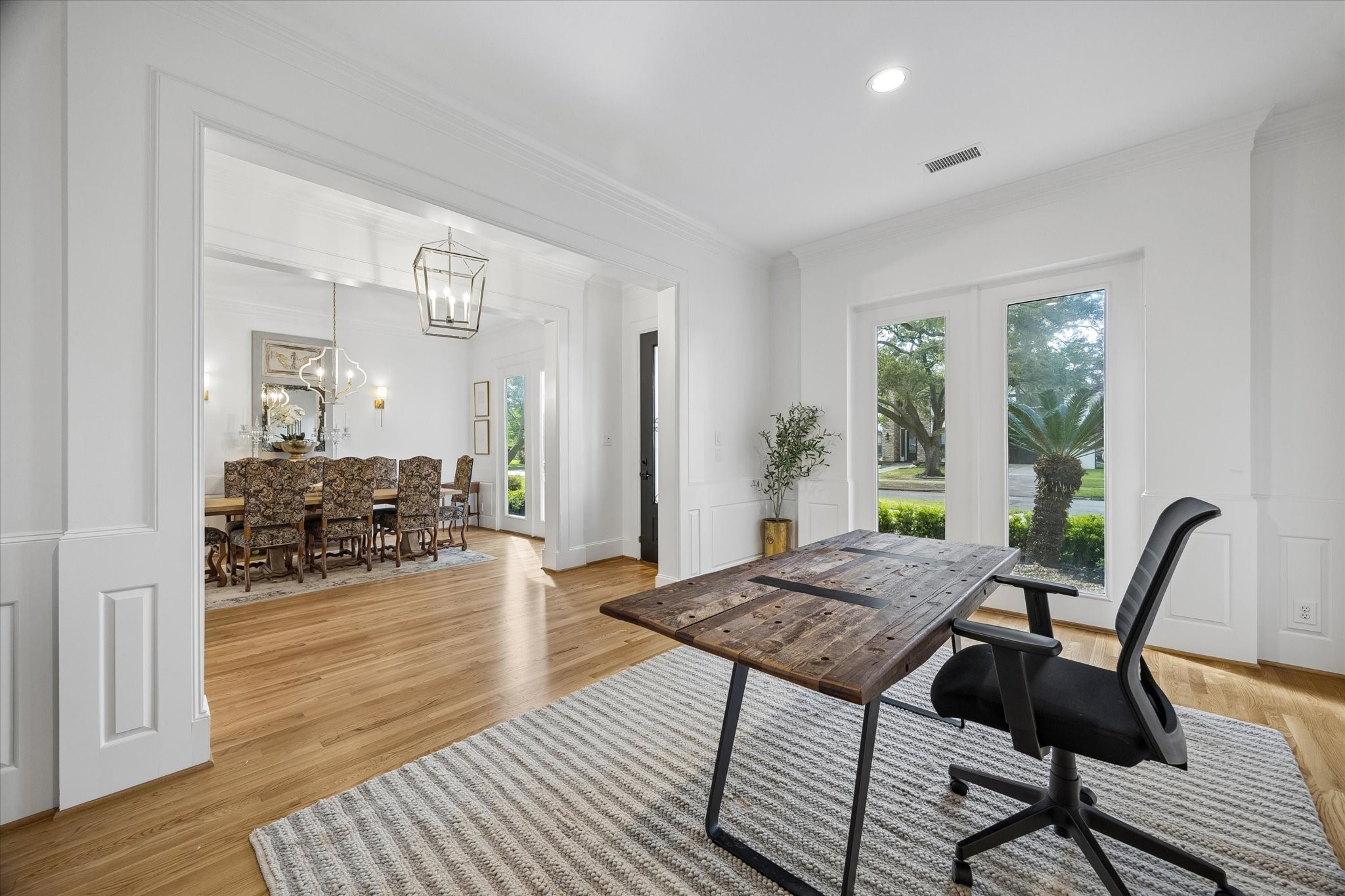 4606 Birch Street Bellaire, TX 77401 - Photo 9 of 45 a living room with furniture and wooden floor