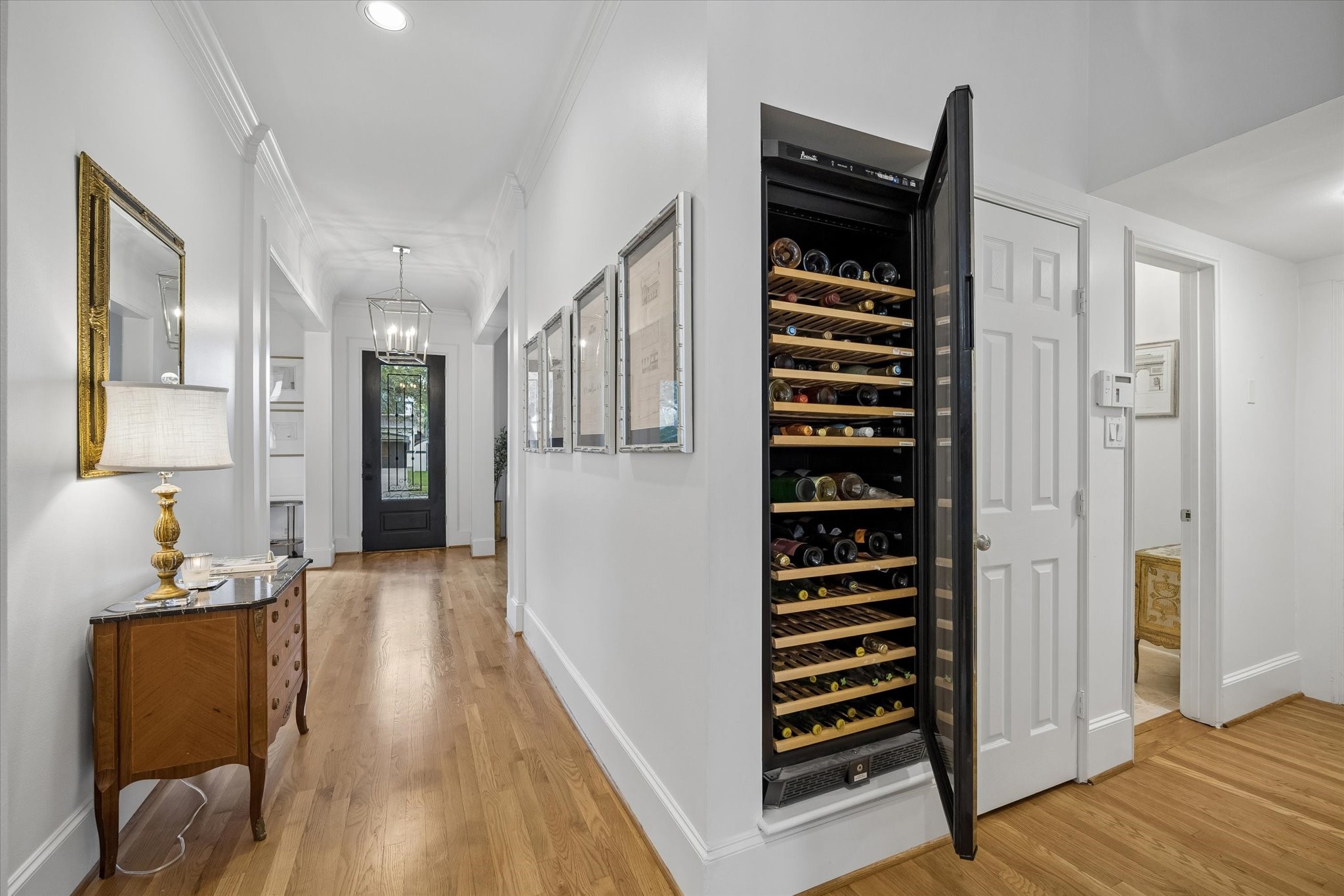 4606 Birch Street Bellaire, TX 77401 - Photo 10 of 45 a view of a living room with furniture and wooden floor