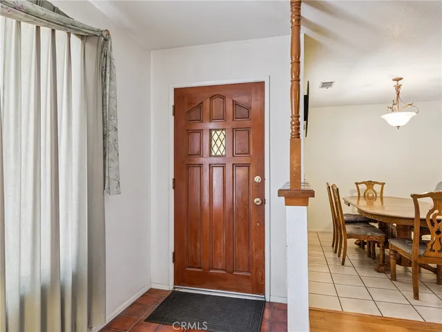 a view of a livingroom with furniture and window