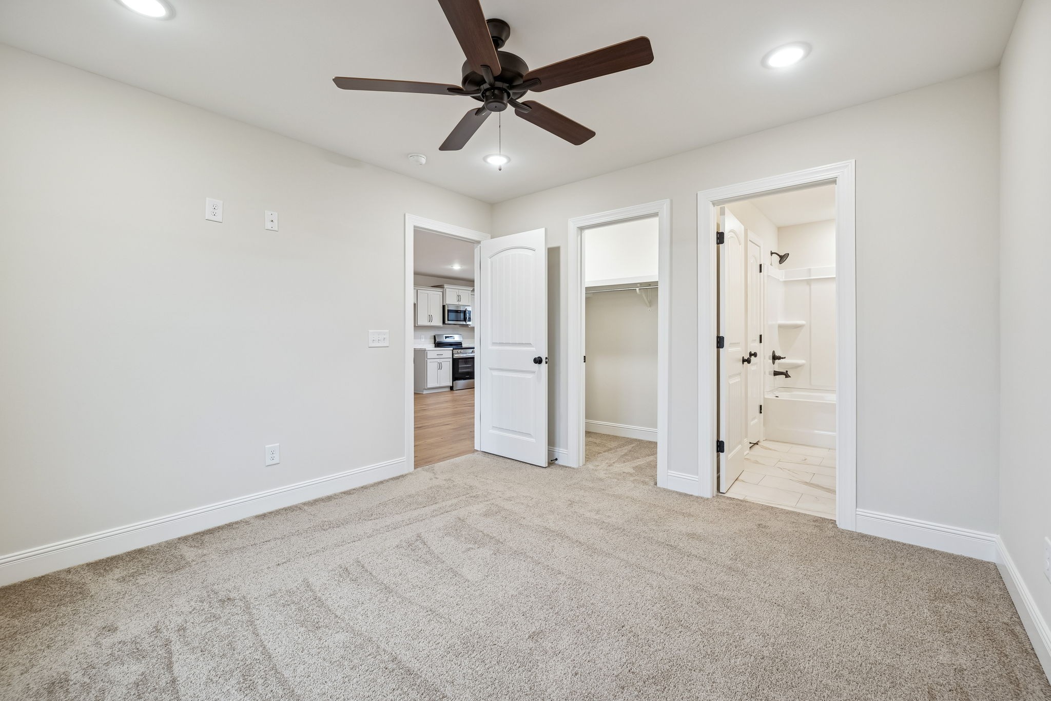 1035 Landing Lane Adams, TN 37010 - Photo 14 of 26 an empty room with closet and a ceiling fan